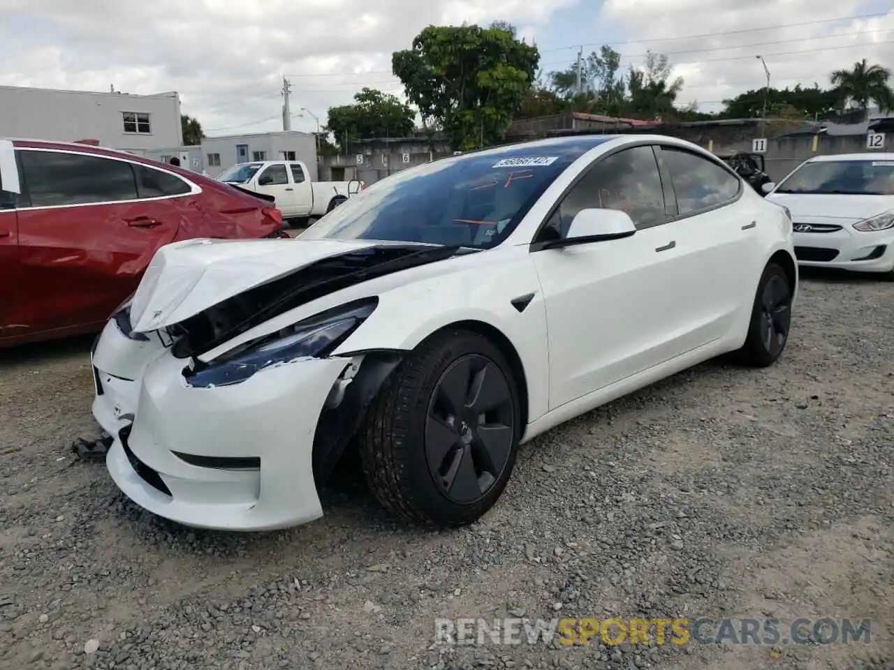 2 Photograph of a damaged car 5YJ3E1EA4MF989658 TESLA MODEL 3 2021