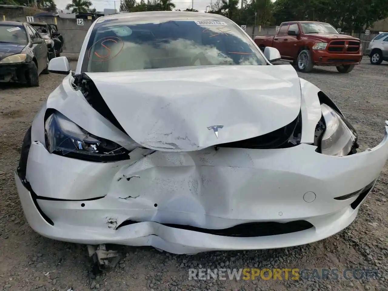 9 Photograph of a damaged car 5YJ3E1EA4MF989658 TESLA MODEL 3 2021