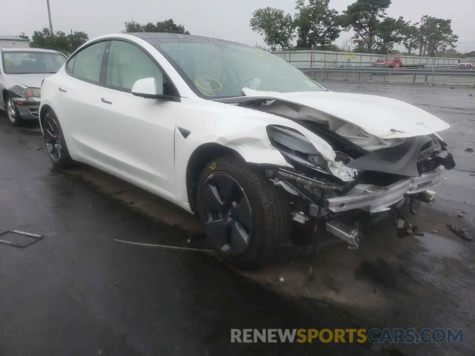 1 Photograph of a damaged car 5YJ3E1EA4MF989823 TESLA MODEL 3 2021