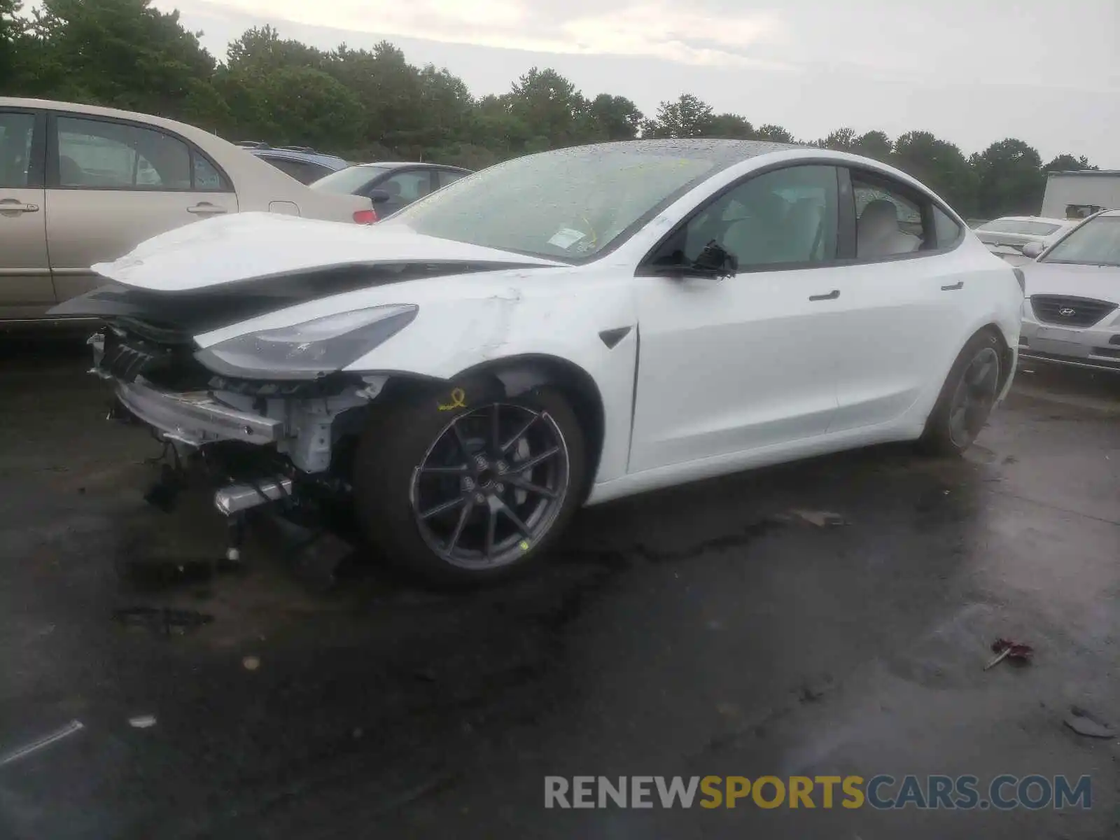 2 Photograph of a damaged car 5YJ3E1EA4MF989823 TESLA MODEL 3 2021