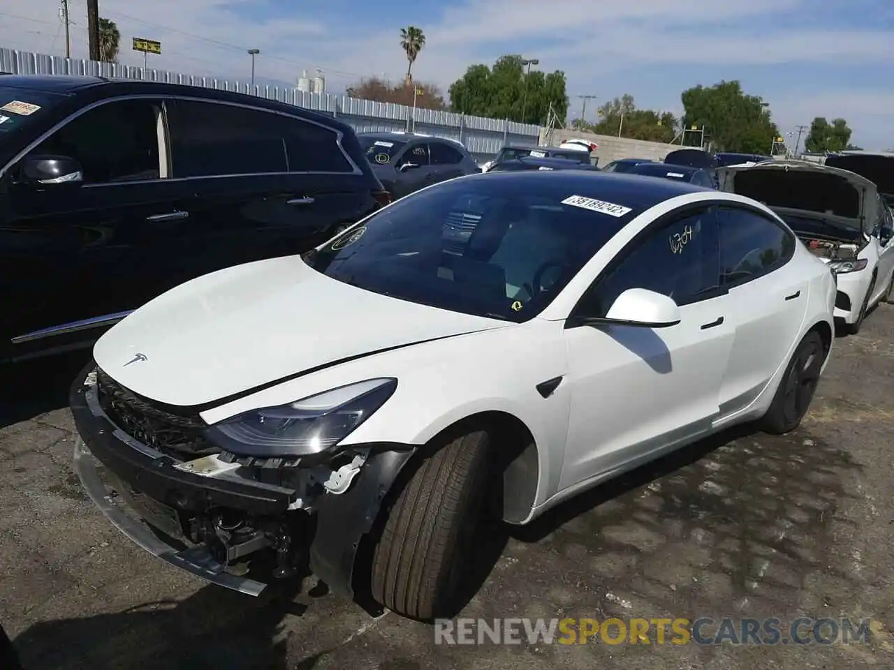 2 Photograph of a damaged car 5YJ3E1EA5MF000704 TESLA MODEL 3 2021