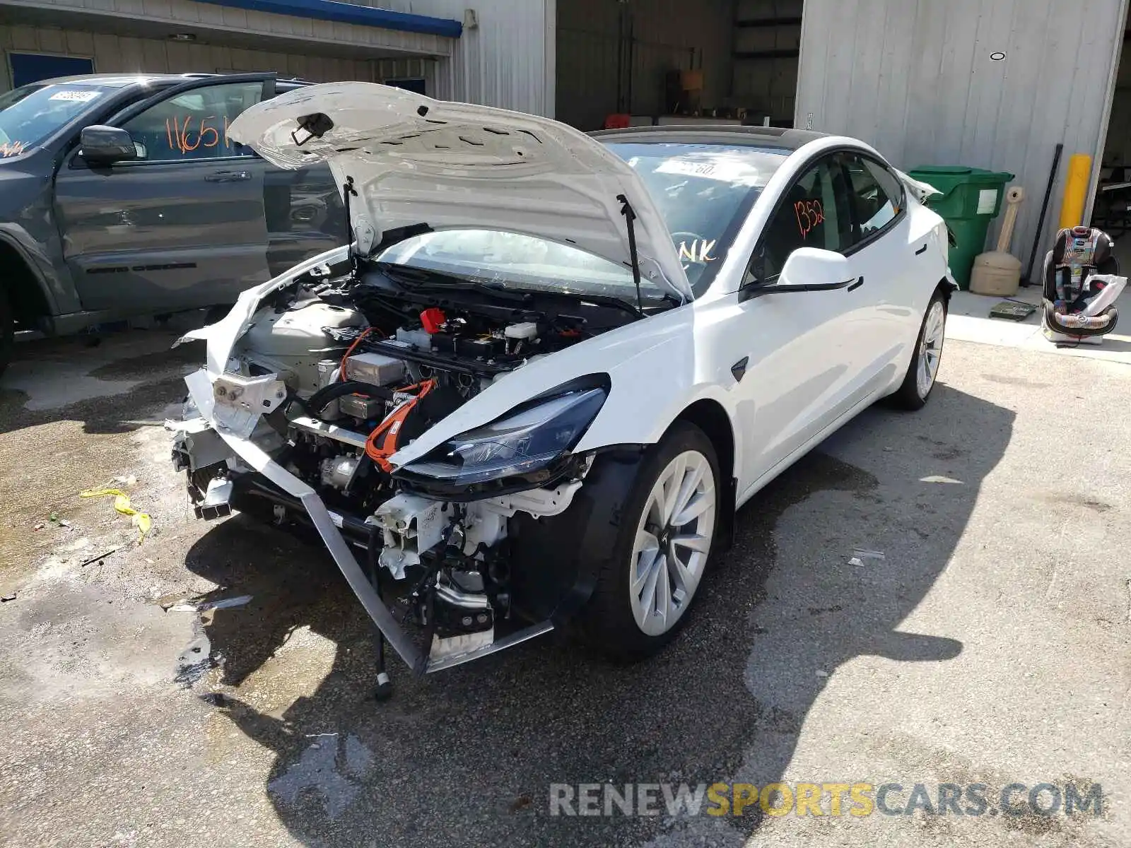 2 Photograph of a damaged car 5YJ3E1EA5MF029328 TESLA MODEL 3 2021