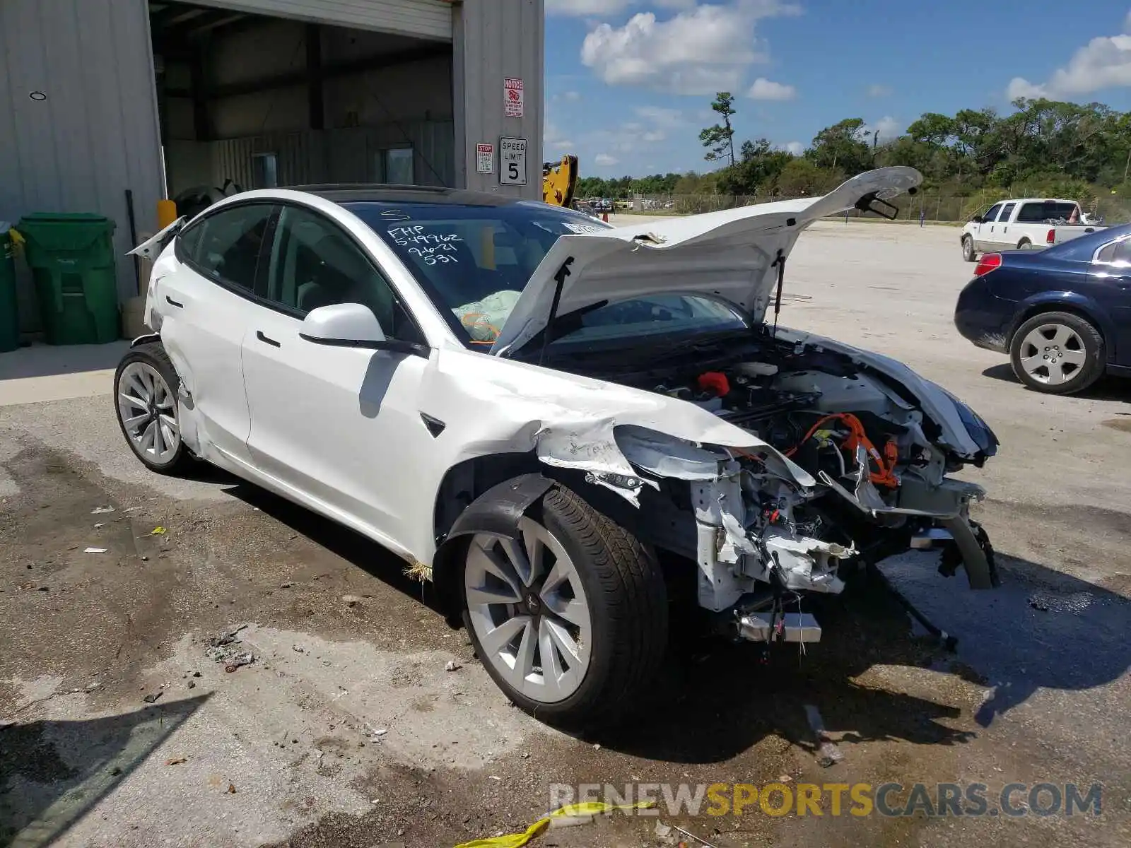 4 Photograph of a damaged car 5YJ3E1EA5MF029328 TESLA MODEL 3 2021