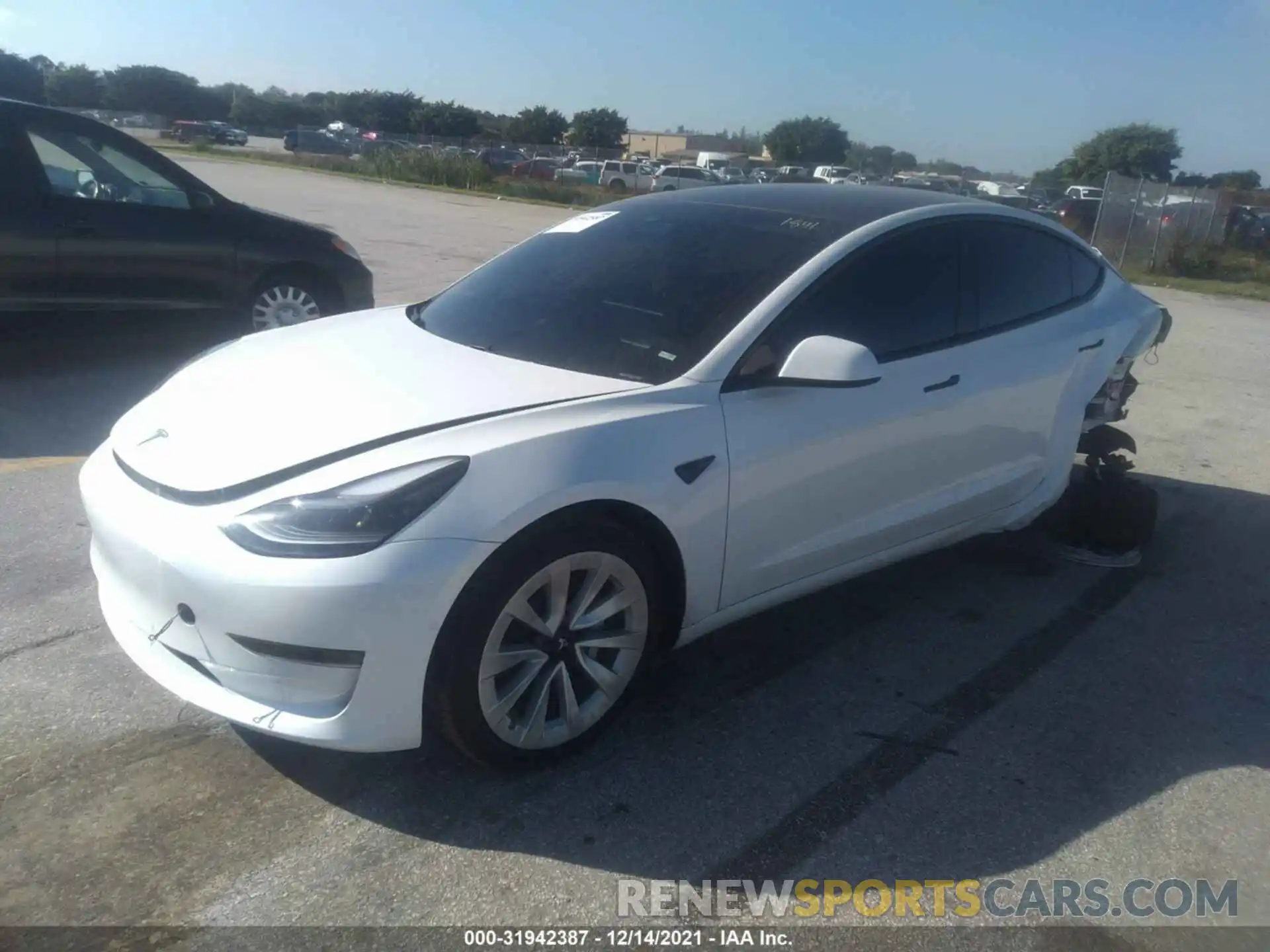 2 Photograph of a damaged car 5YJ3E1EA5MF031841 TESLA MODEL 3 2021