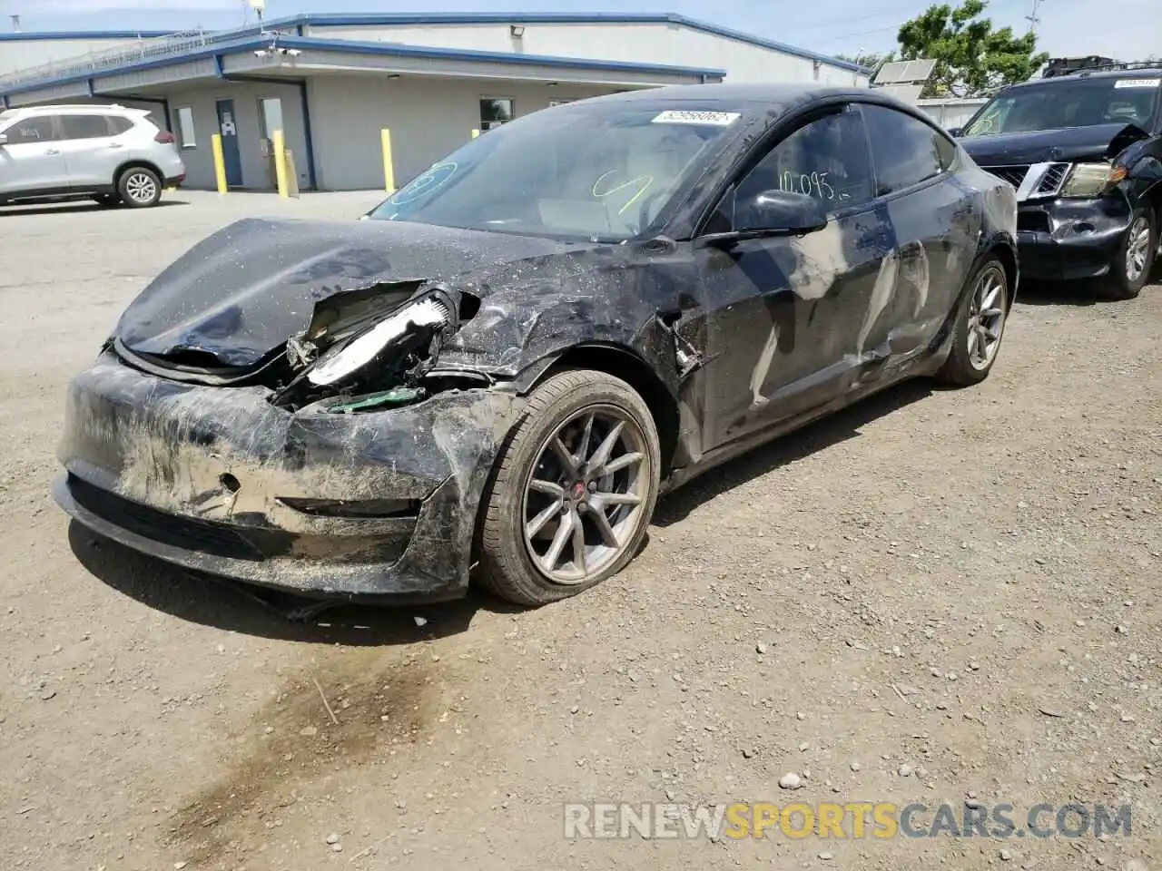 2 Photograph of a damaged car 5YJ3E1EA5MF053368 TESLA MODEL 3 2021