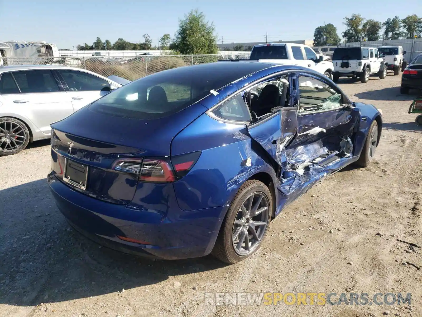 4 Photograph of a damaged car 5YJ3E1EA5MF060658 TESLA MODEL 3 2021