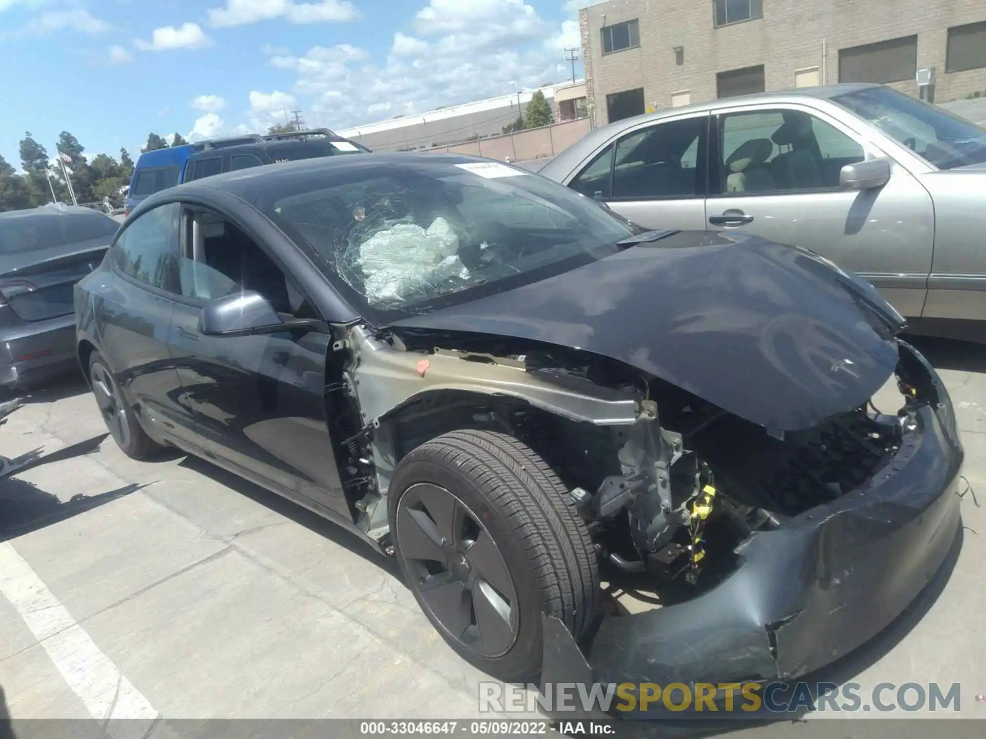 1 Photograph of a damaged car 5YJ3E1EA5MF071093 TESLA MODEL 3 2021