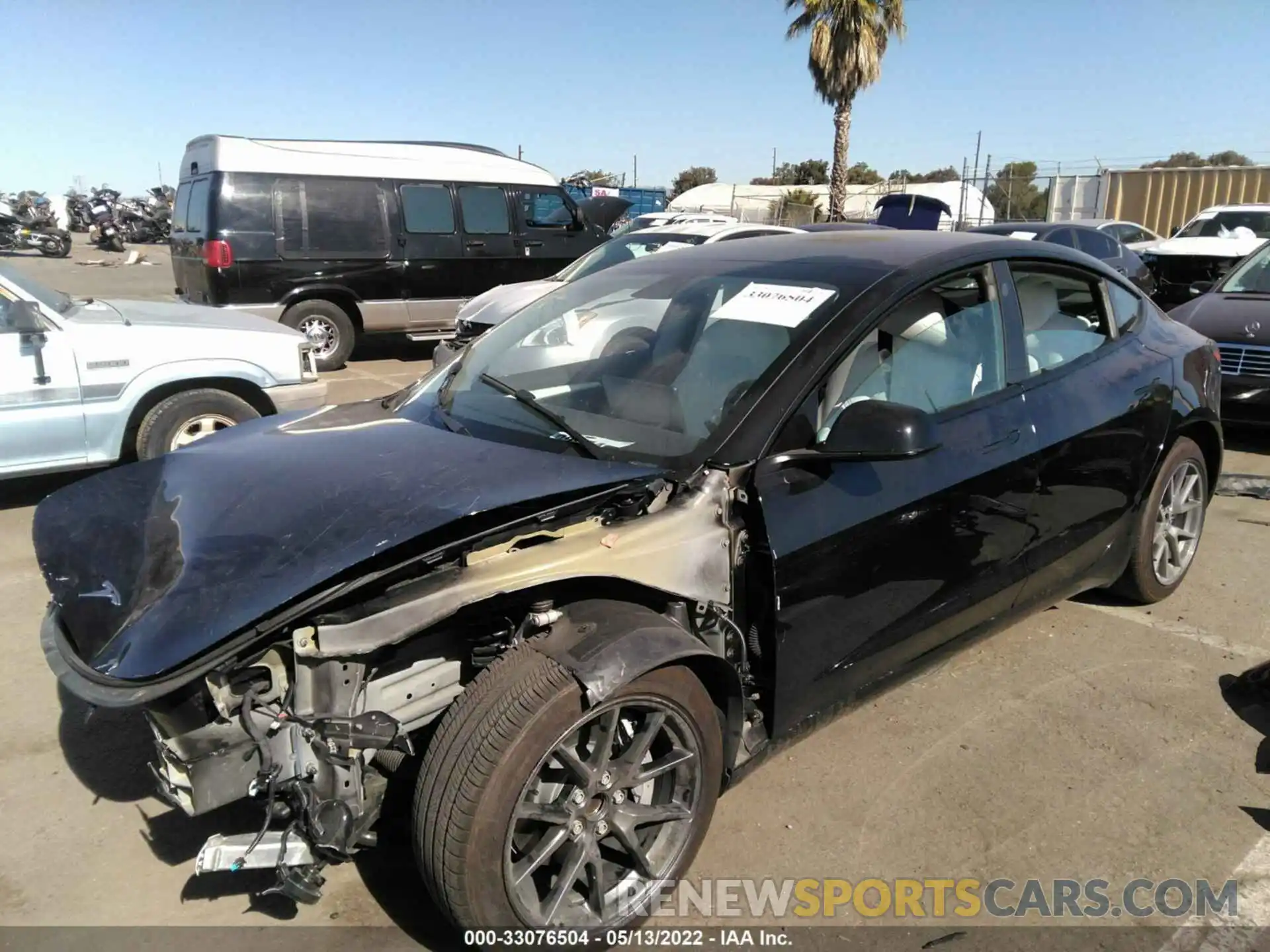 2 Photograph of a damaged car 5YJ3E1EA5MF085916 TESLA MODEL 3 2021