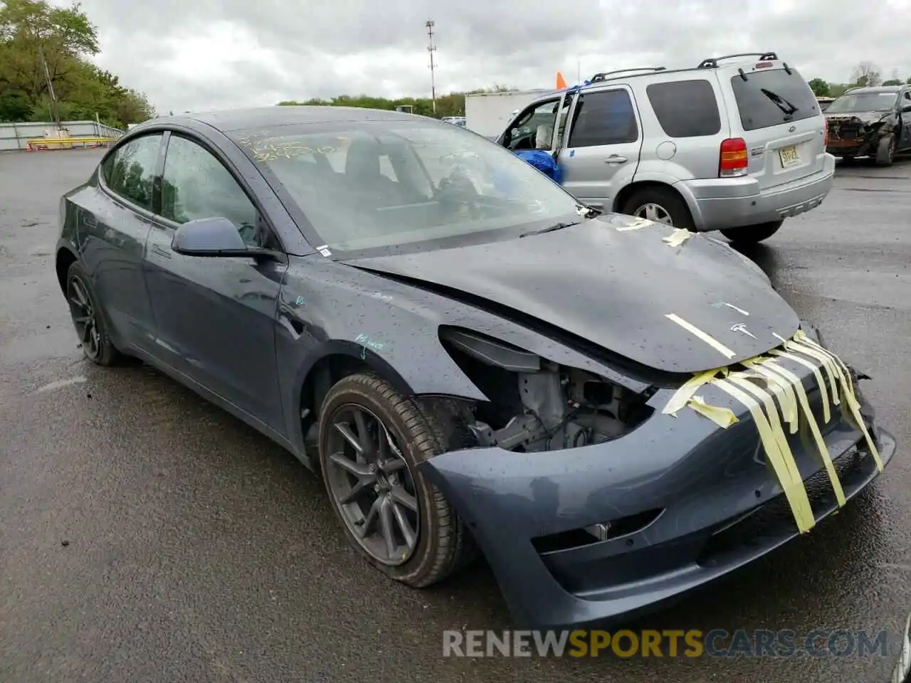 1 Photograph of a damaged car 5YJ3E1EA5MF086001 TESLA MODEL 3 2021