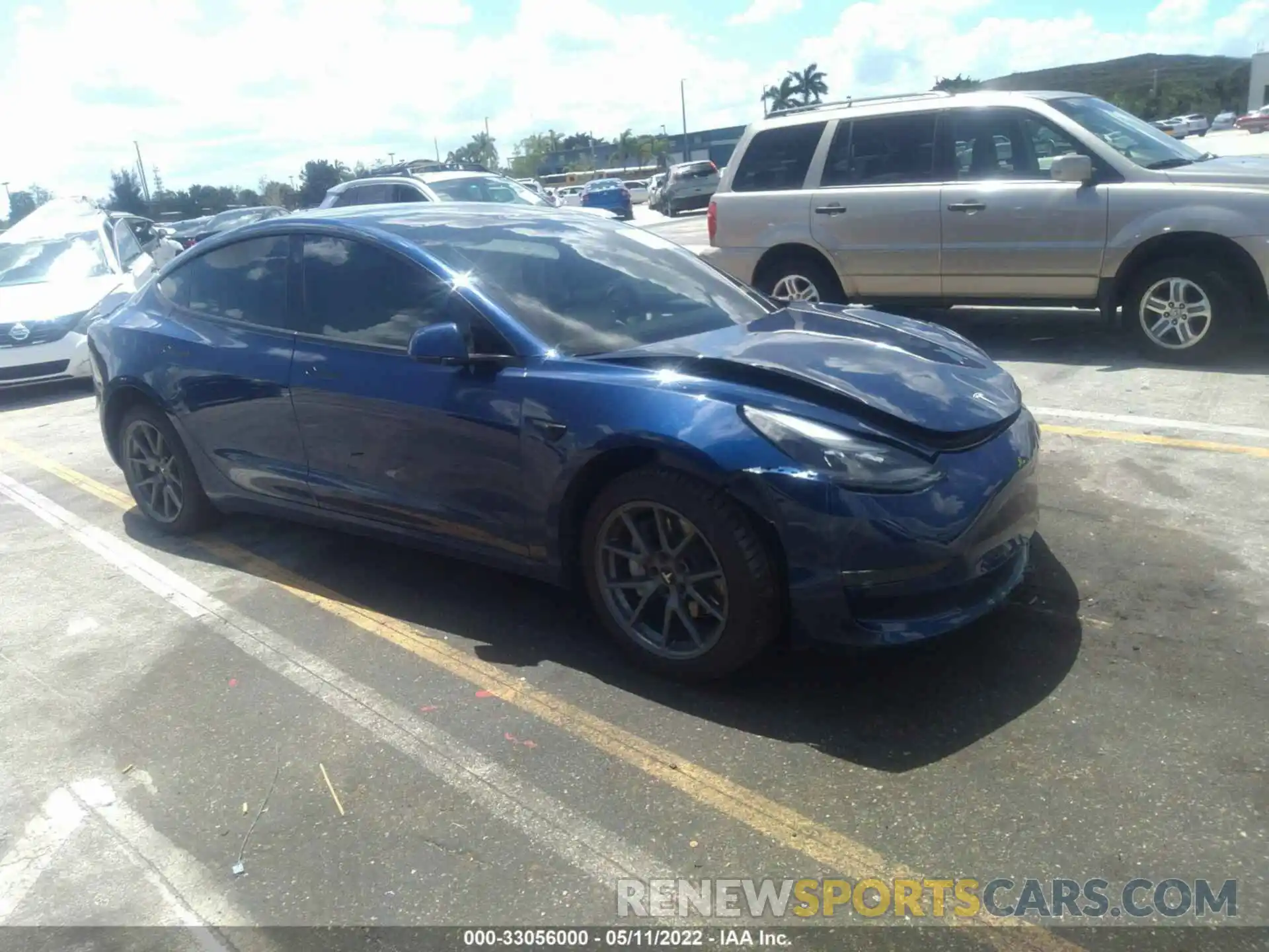 1 Photograph of a damaged car 5YJ3E1EA5MF087861 TESLA MODEL 3 2021