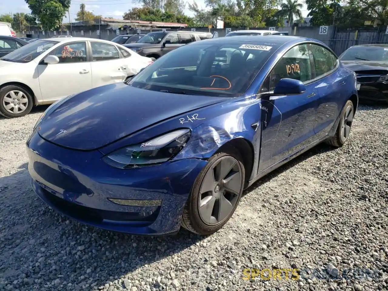 2 Photograph of a damaged car 5YJ3E1EA5MF088976 TESLA MODEL 3 2021