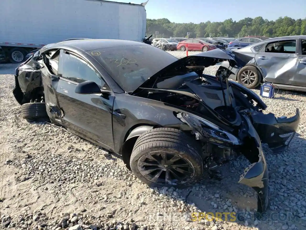 1 Photograph of a damaged car 5YJ3E1EA5MF097886 TESLA MODEL 3 2021