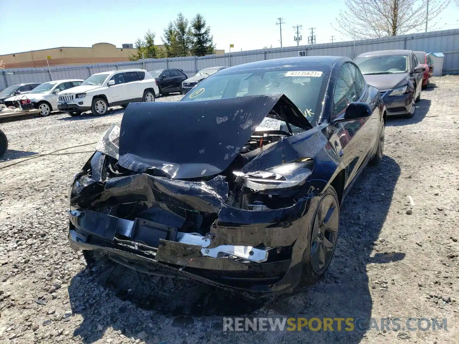 2 Photograph of a damaged car 5YJ3E1EA5MF857430 TESLA MODEL 3 2021