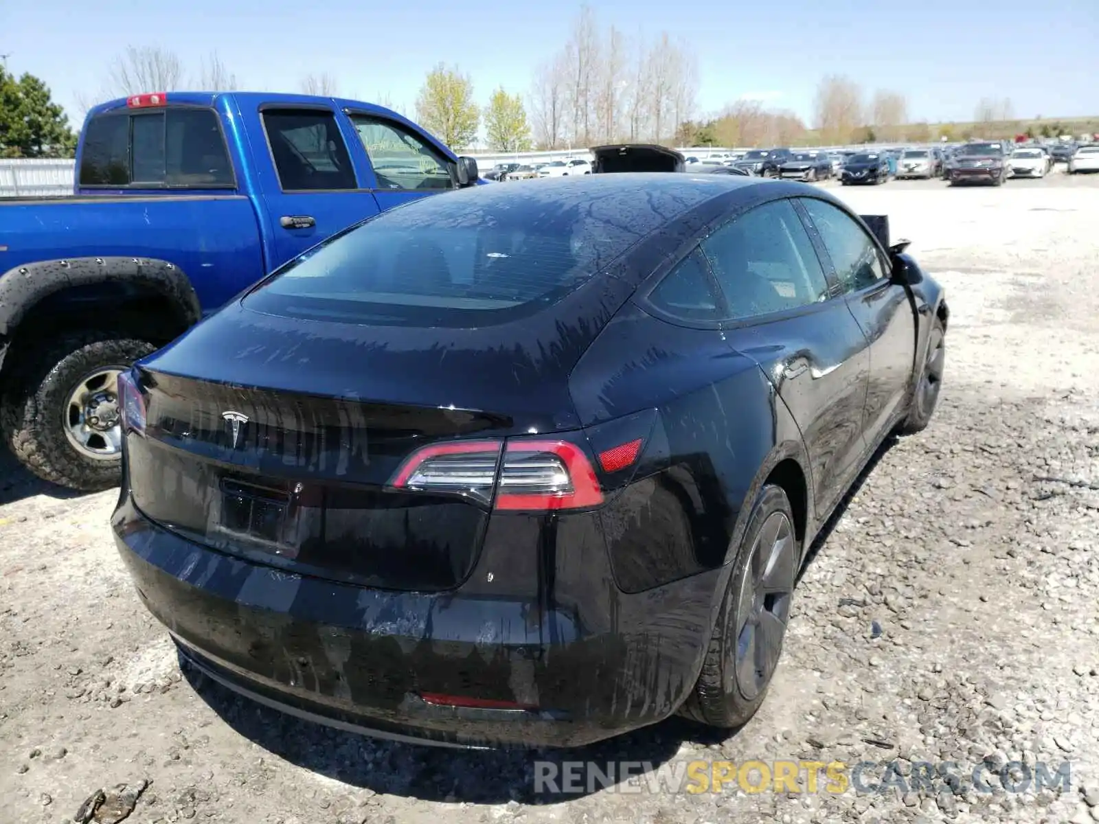 4 Photograph of a damaged car 5YJ3E1EA5MF857430 TESLA MODEL 3 2021