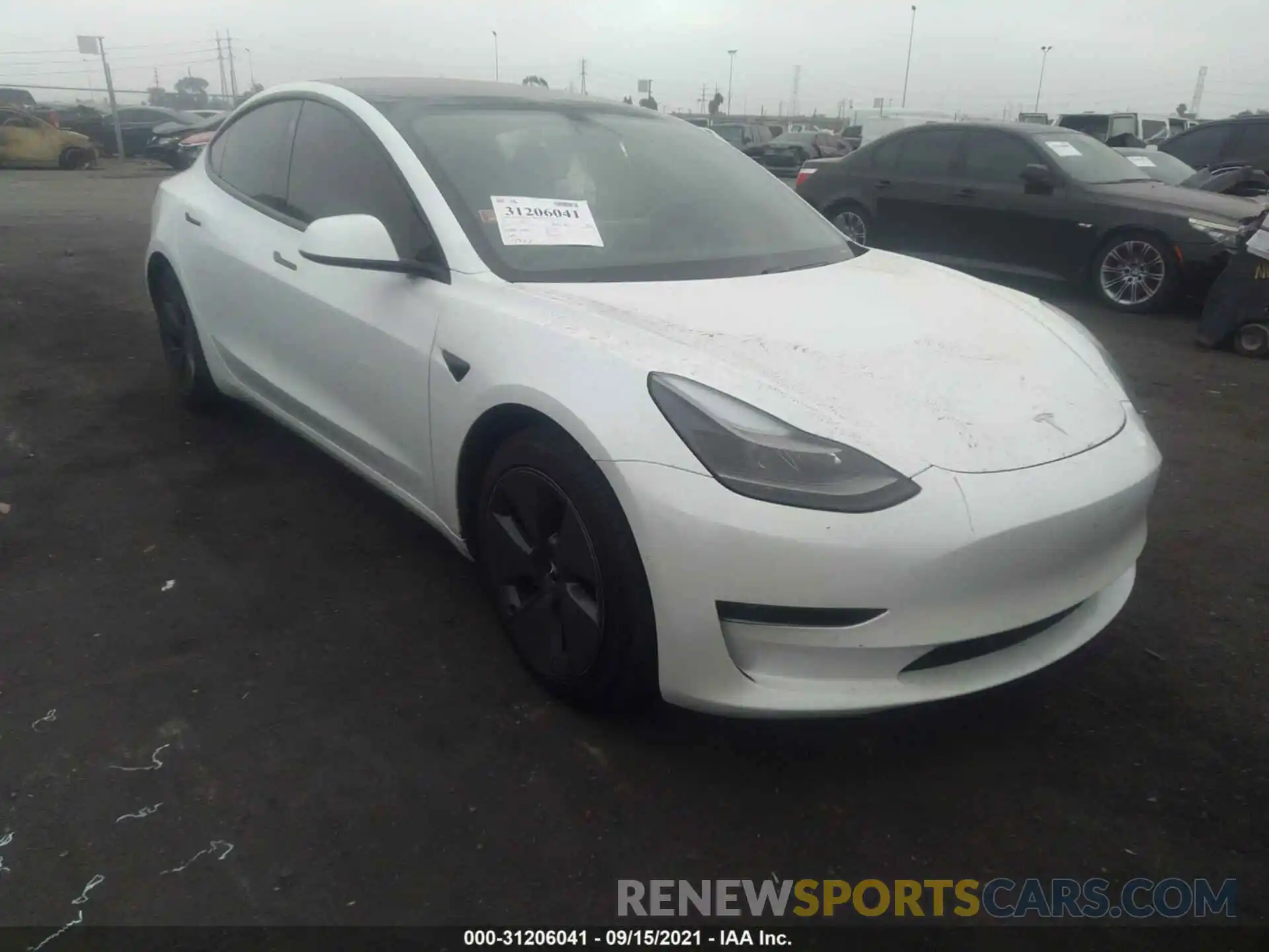 1 Photograph of a damaged car 5YJ3E1EA5MF867388 TESLA MODEL 3 2021