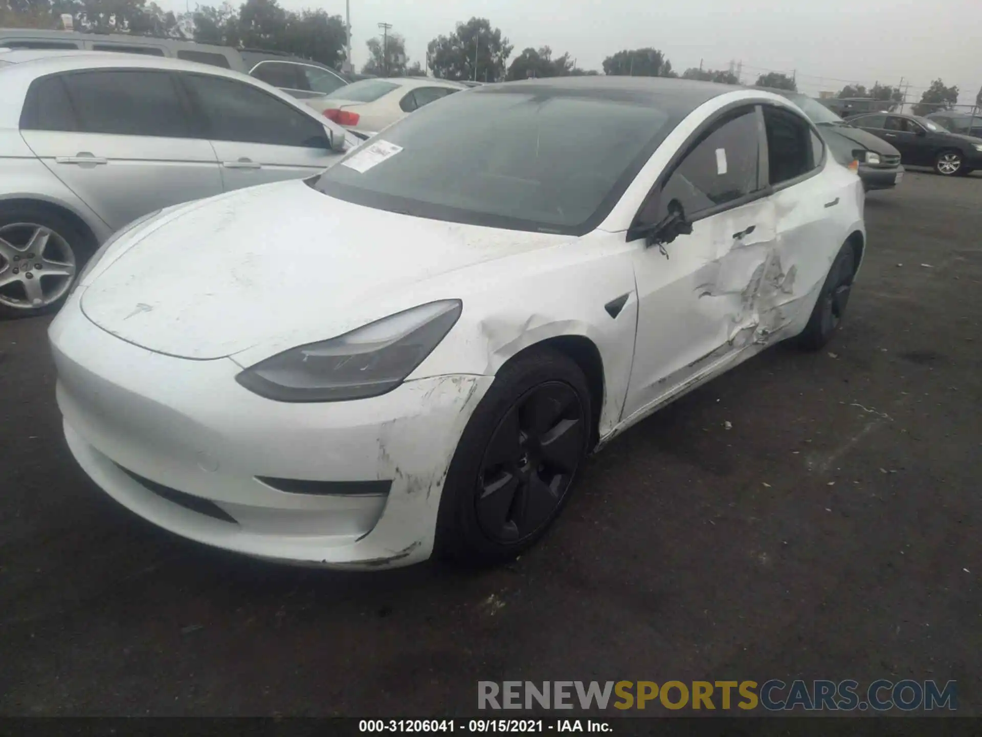 2 Photograph of a damaged car 5YJ3E1EA5MF867388 TESLA MODEL 3 2021