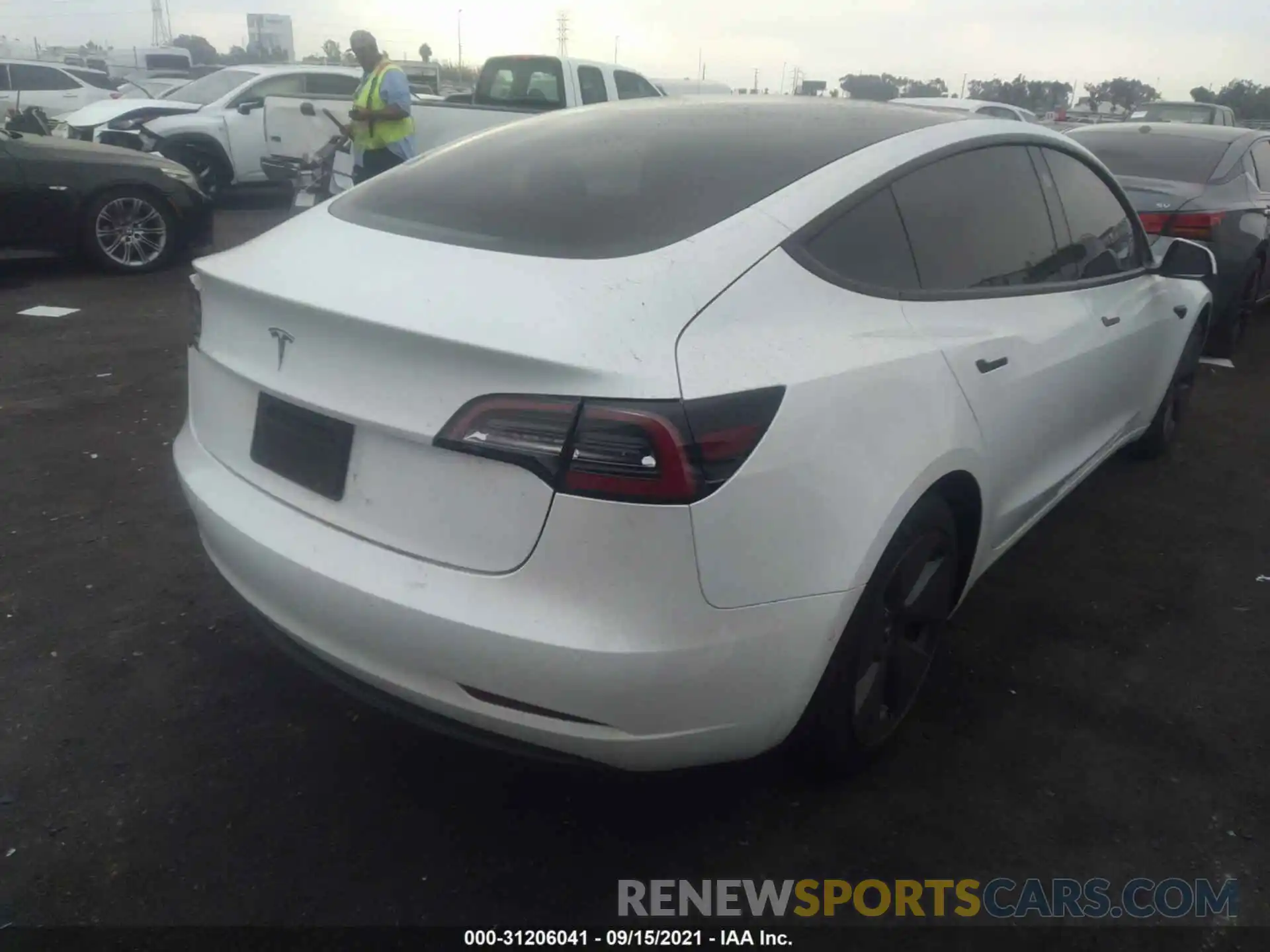 4 Photograph of a damaged car 5YJ3E1EA5MF867388 TESLA MODEL 3 2021