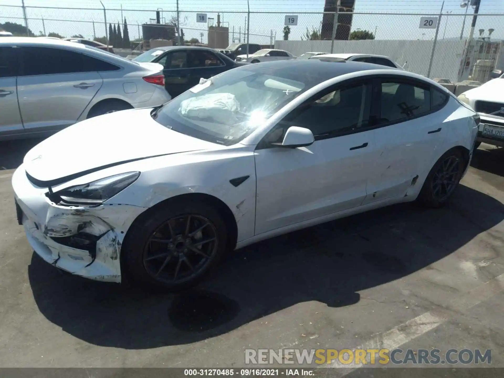 2 Photograph of a damaged car 5YJ3E1EA5MF867665 TESLA MODEL 3 2021