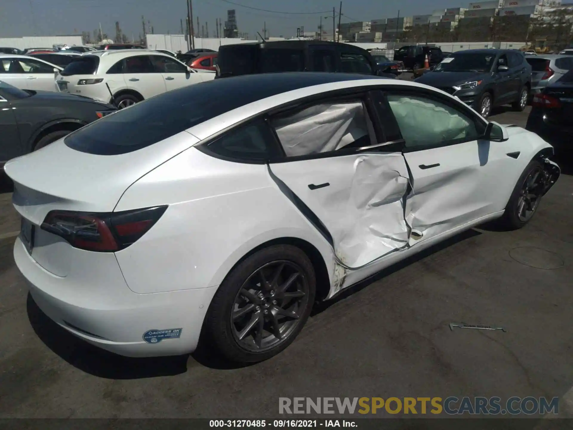 4 Photograph of a damaged car 5YJ3E1EA5MF867665 TESLA MODEL 3 2021