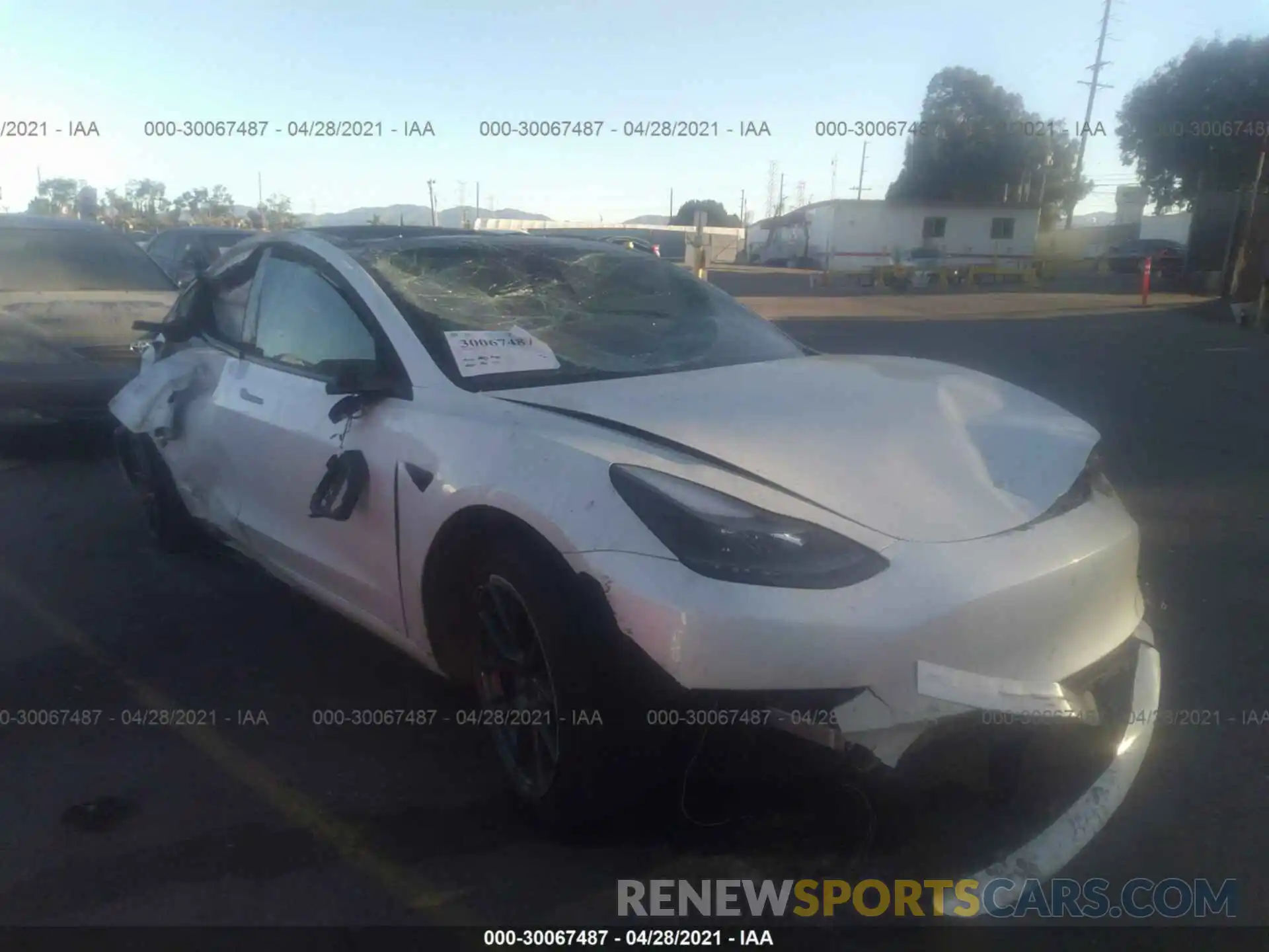 1 Photograph of a damaged car 5YJ3E1EA5MF871893 TESLA MODEL 3 2021