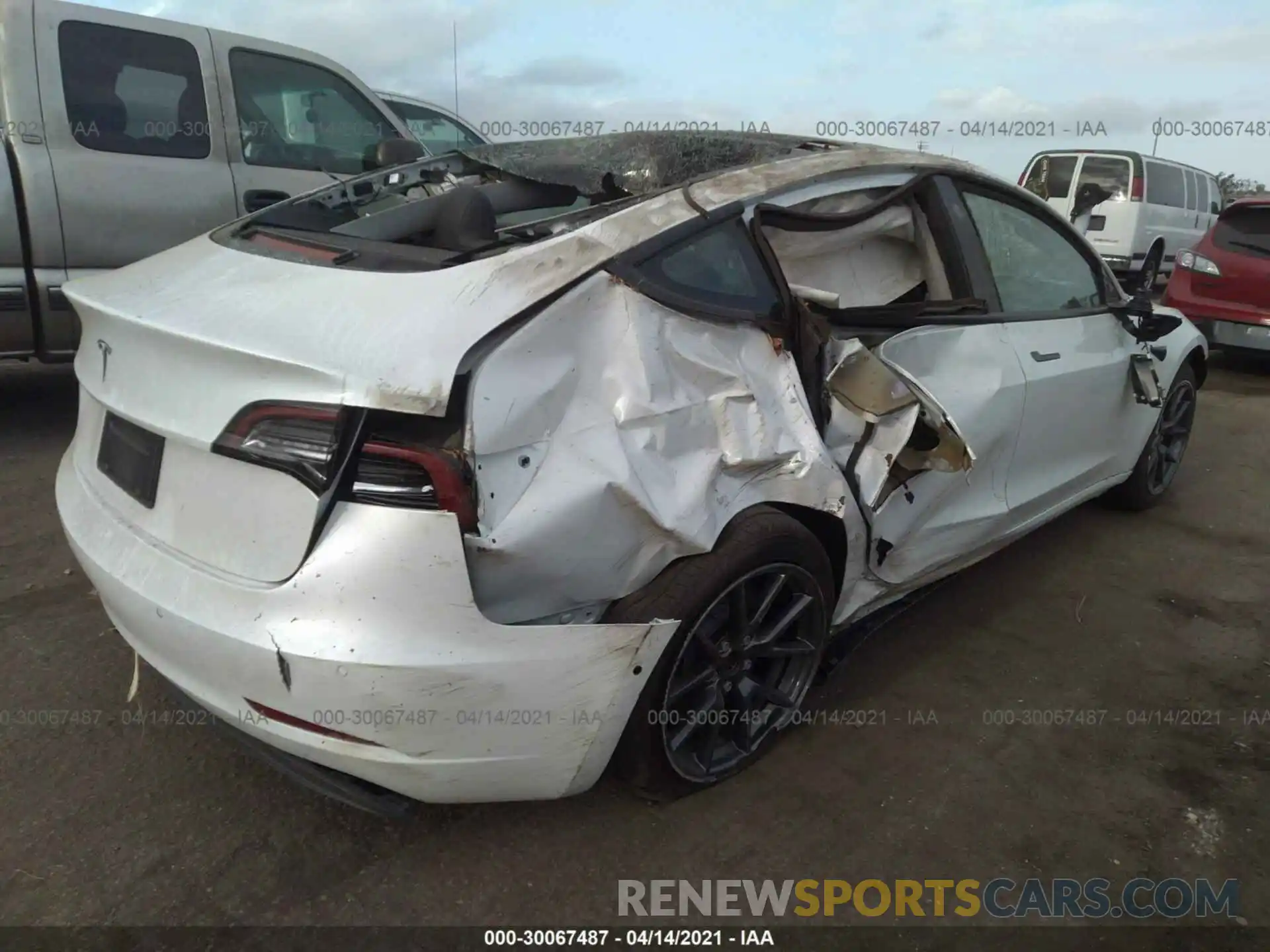 4 Photograph of a damaged car 5YJ3E1EA5MF871893 TESLA MODEL 3 2021