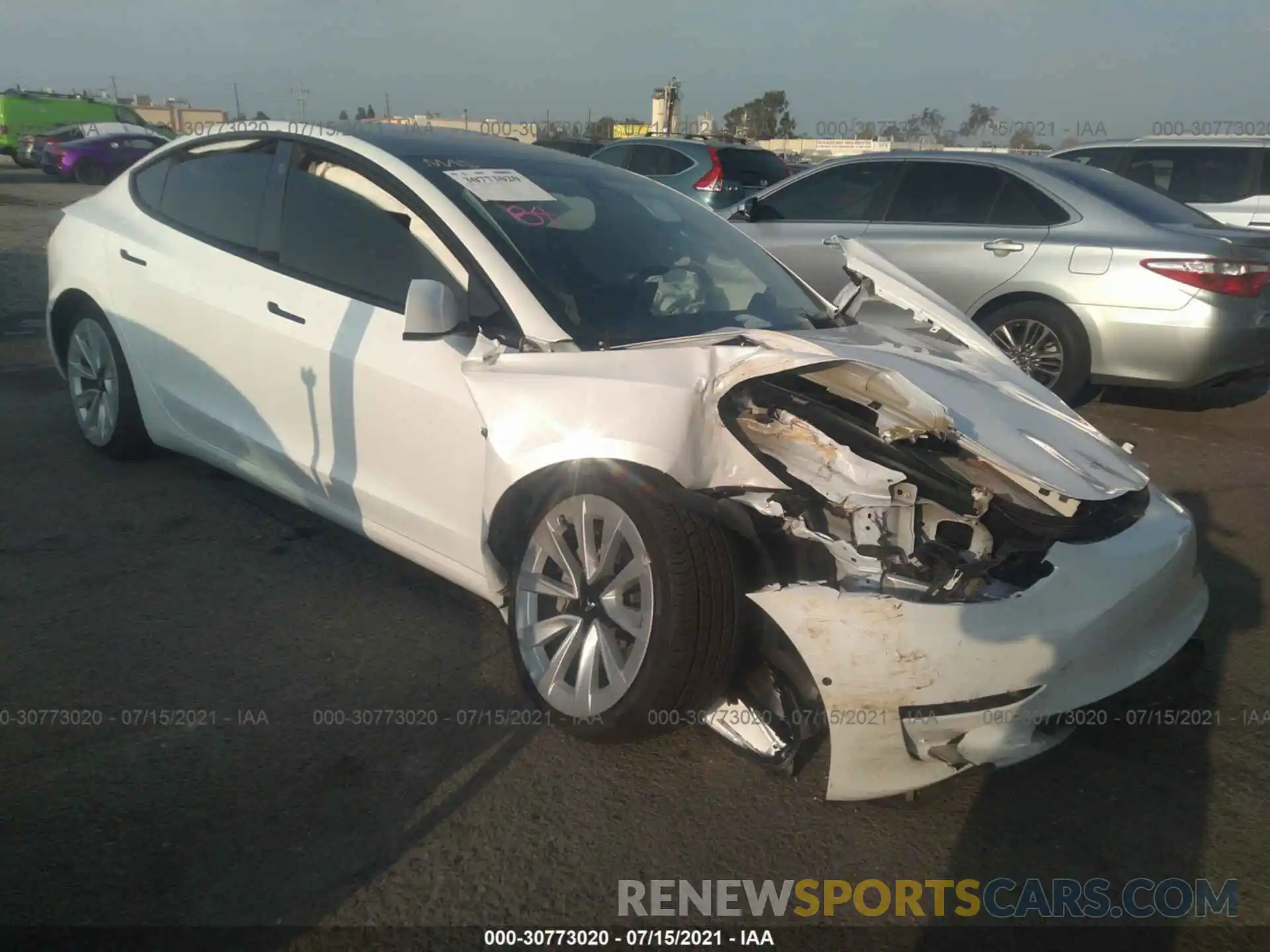 1 Photograph of a damaged car 5YJ3E1EA5MF872140 TESLA MODEL 3 2021