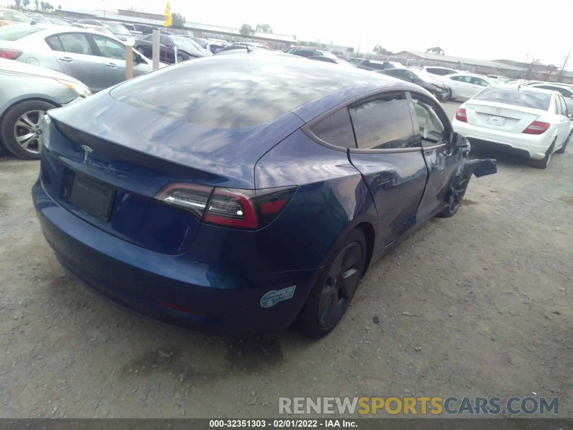 4 Photograph of a damaged car 5YJ3E1EA5MF872459 TESLA MODEL 3 2021