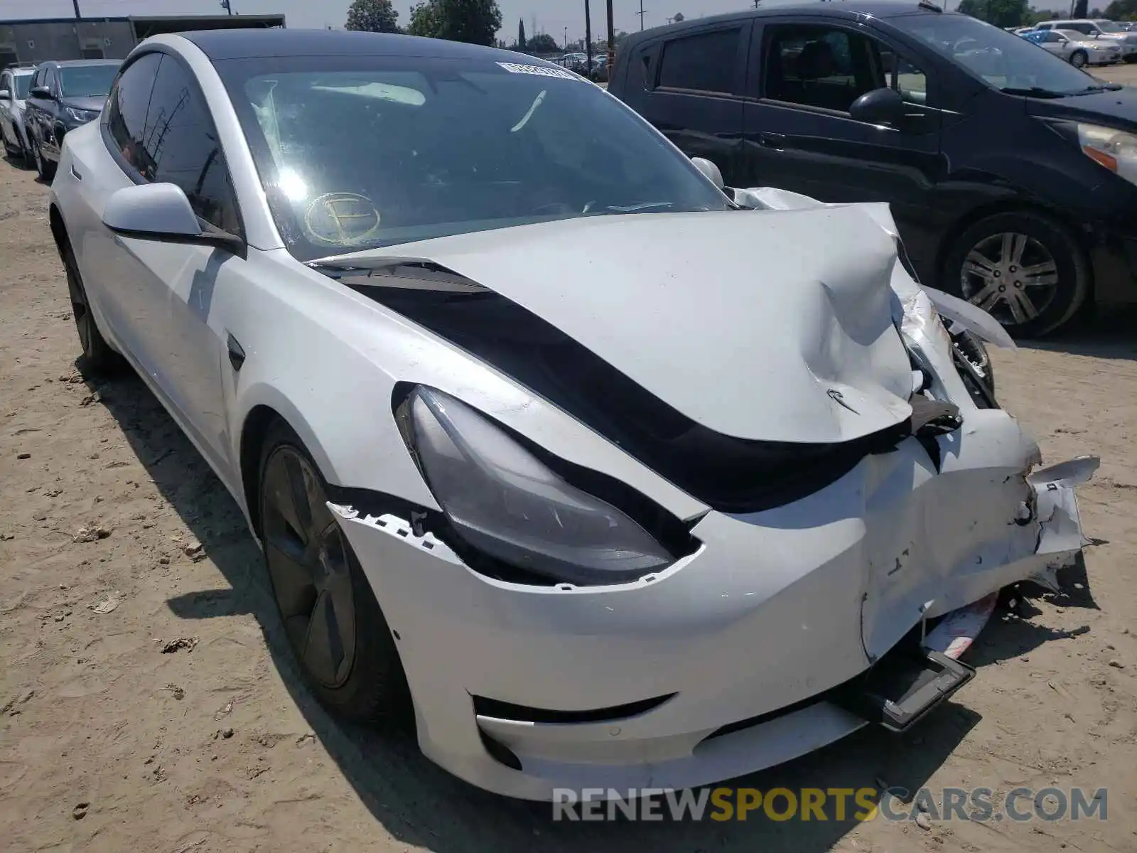 1 Photograph of a damaged car 5YJ3E1EA5MF873773 TESLA MODEL 3 2021