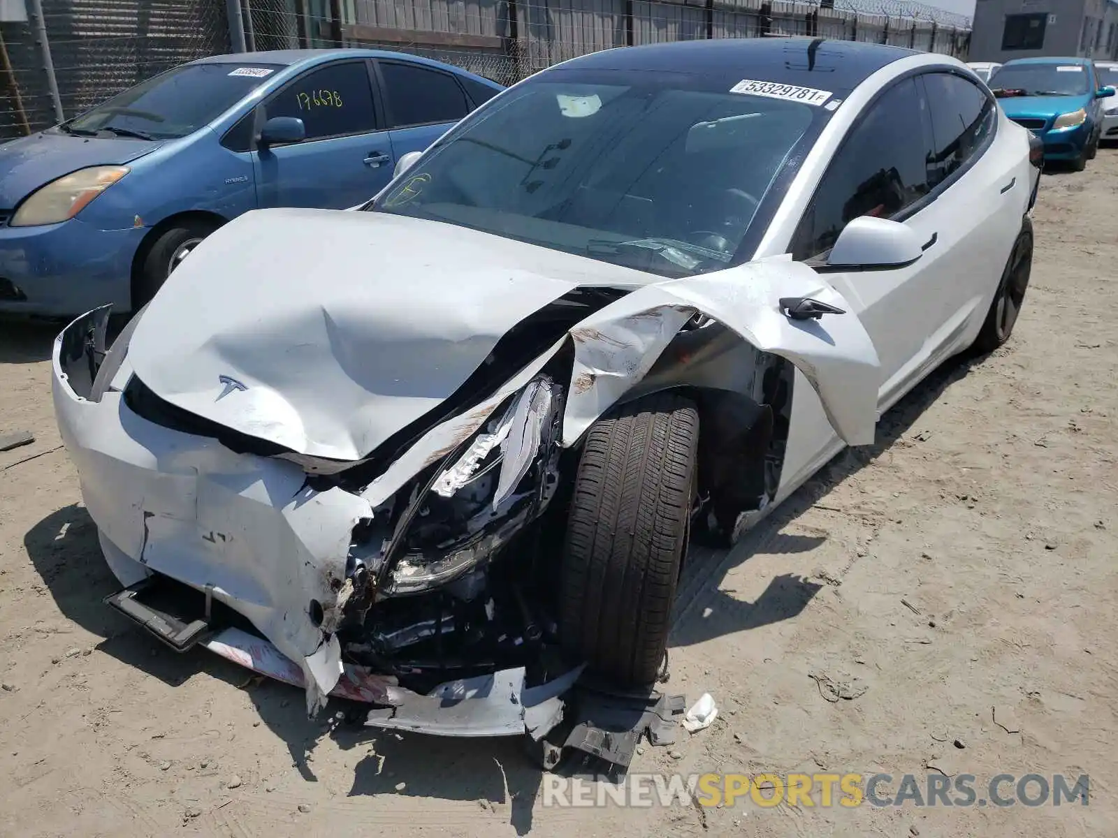 2 Photograph of a damaged car 5YJ3E1EA5MF873773 TESLA MODEL 3 2021