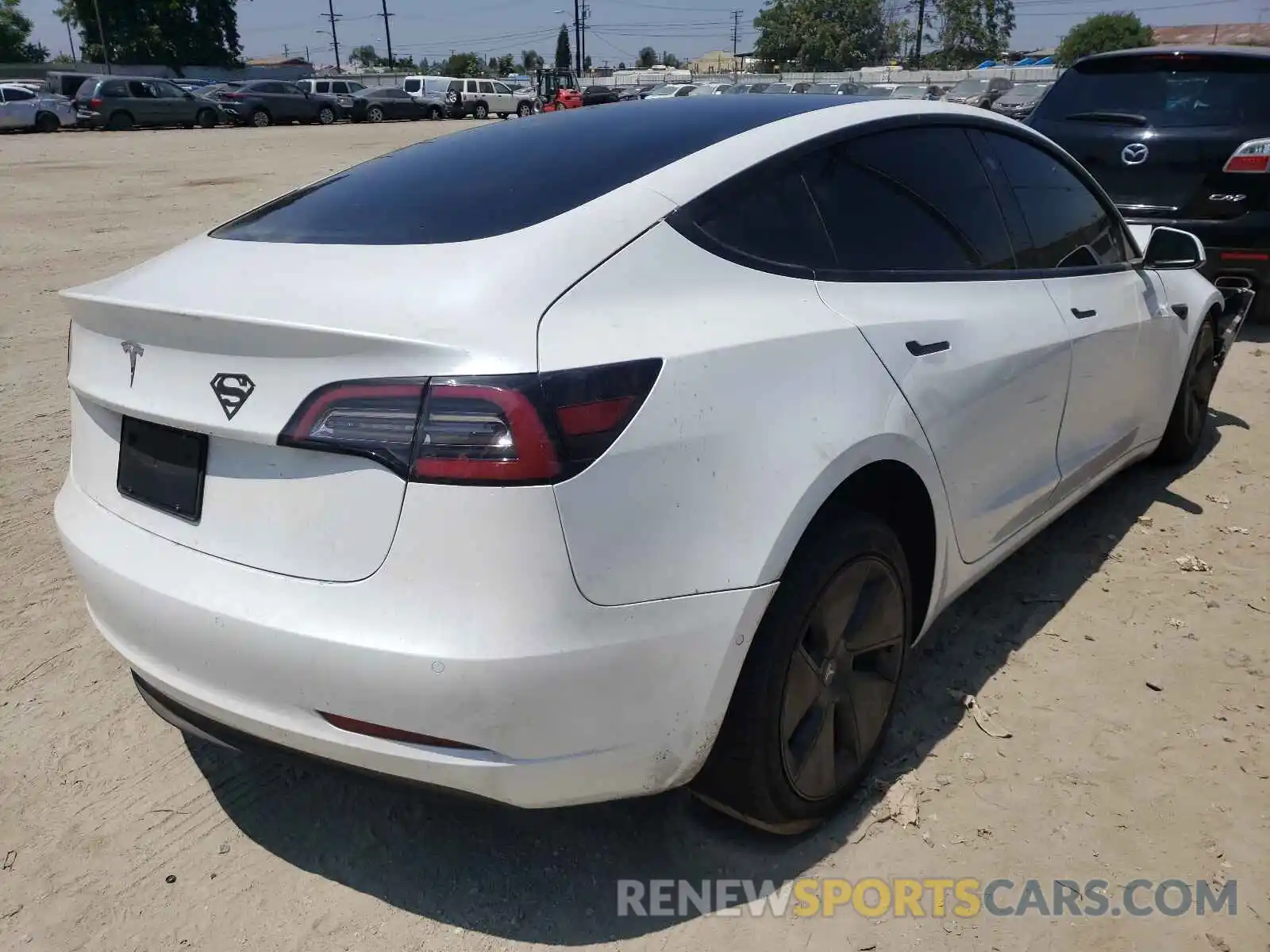 4 Photograph of a damaged car 5YJ3E1EA5MF873773 TESLA MODEL 3 2021