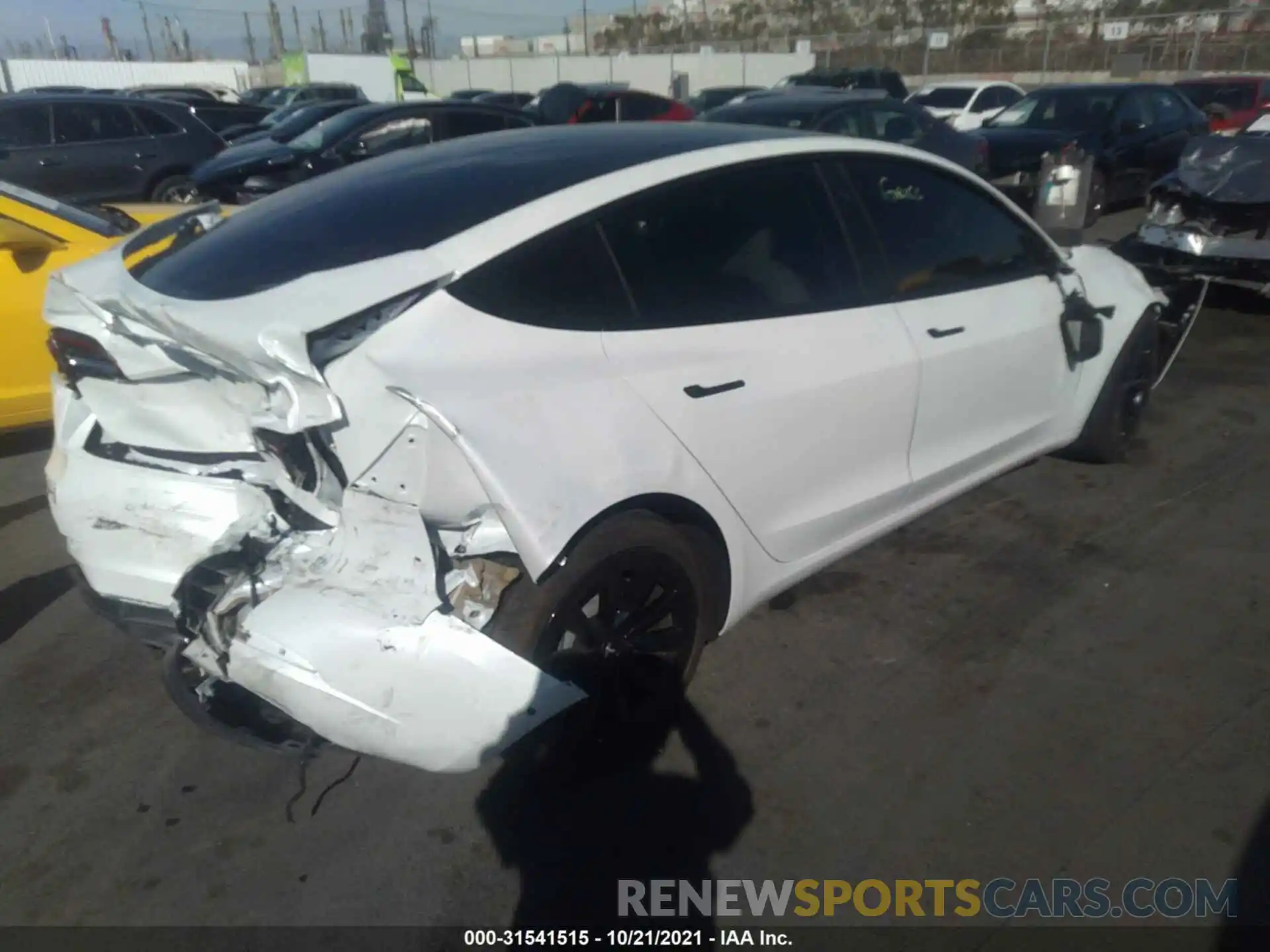 4 Photograph of a damaged car 5YJ3E1EA5MF874583 TESLA MODEL 3 2021