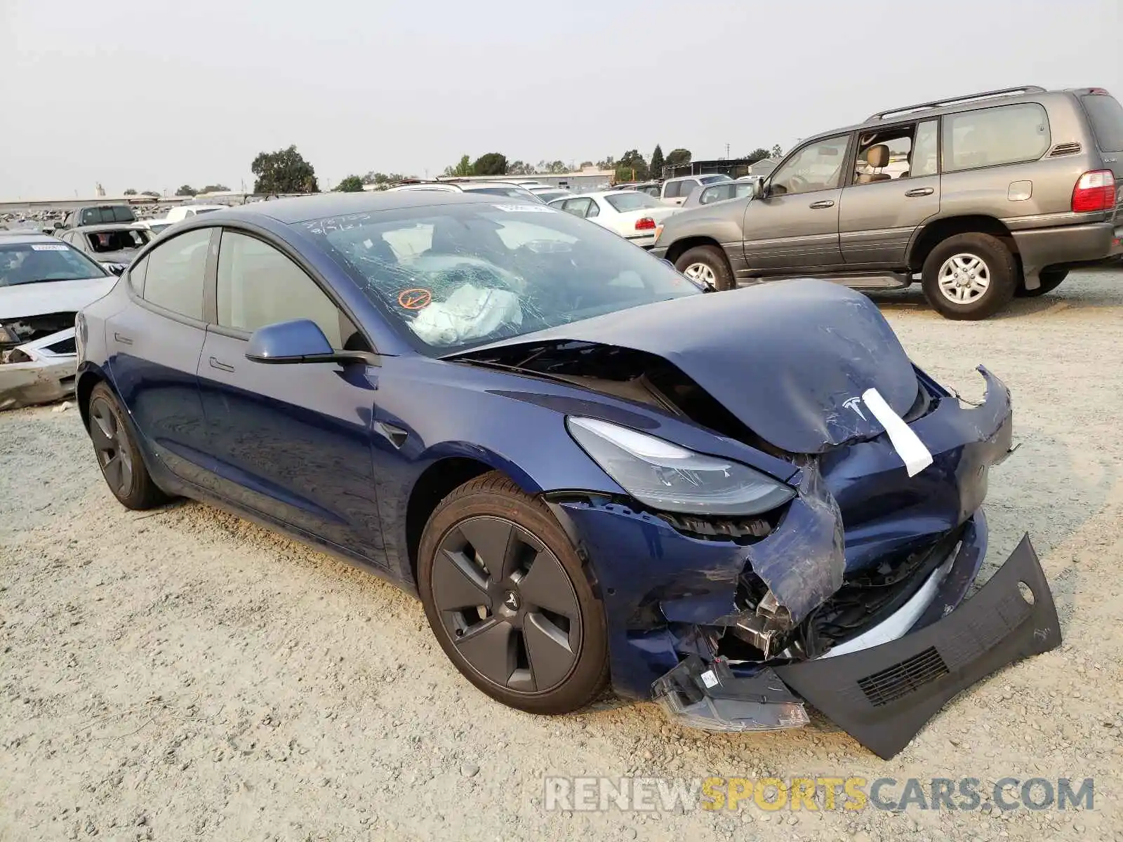 1 Photograph of a damaged car 5YJ3E1EA5MF876415 TESLA MODEL 3 2021