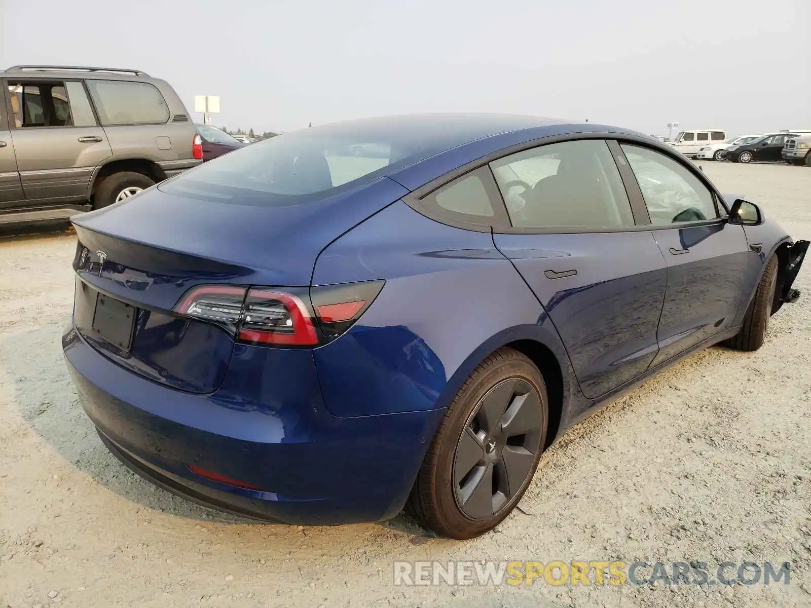 4 Photograph of a damaged car 5YJ3E1EA5MF876415 TESLA MODEL 3 2021