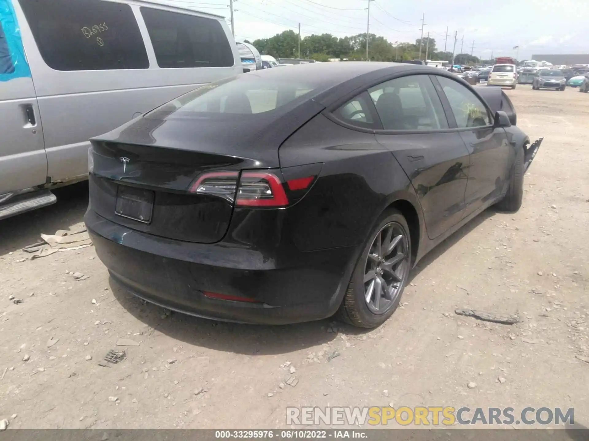 4 Photograph of a damaged car 5YJ3E1EA5MF877743 TESLA MODEL 3 2021