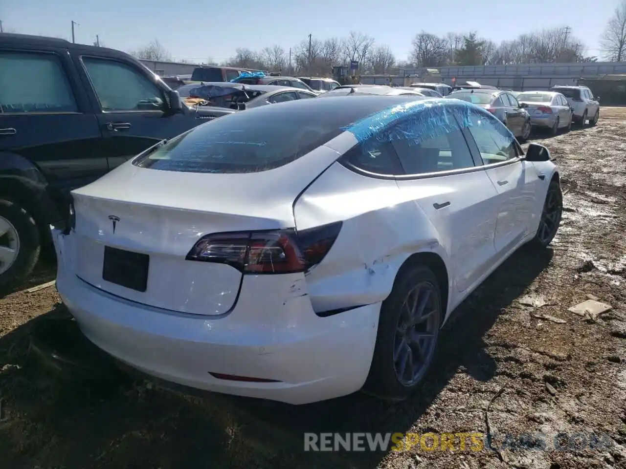 4 Photograph of a damaged car 5YJ3E1EA5MF919697 TESLA MODEL 3 2021