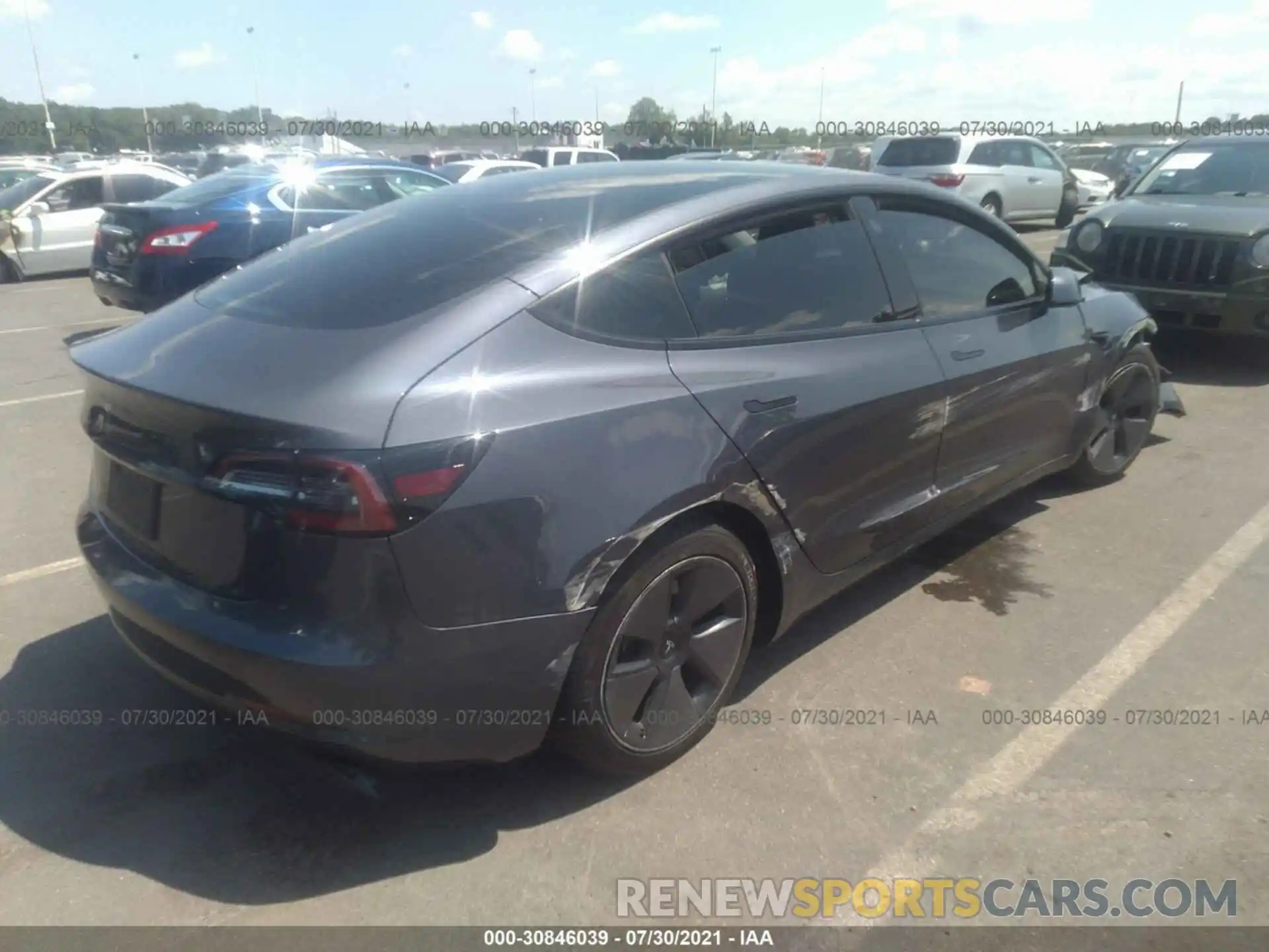 4 Photograph of a damaged car 5YJ3E1EA5MF923068 TESLA MODEL 3 2021