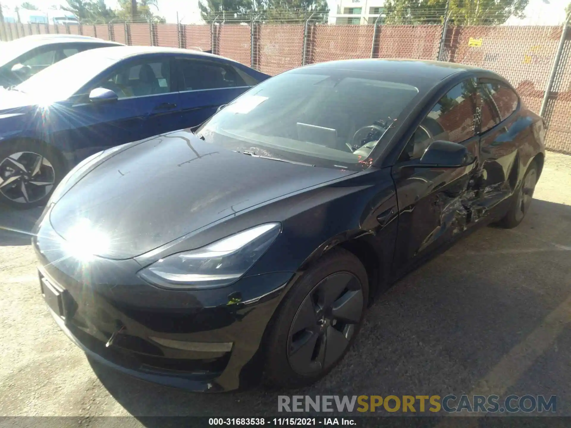 2 Photograph of a damaged car 5YJ3E1EA5MF930263 TESLA MODEL 3 2021