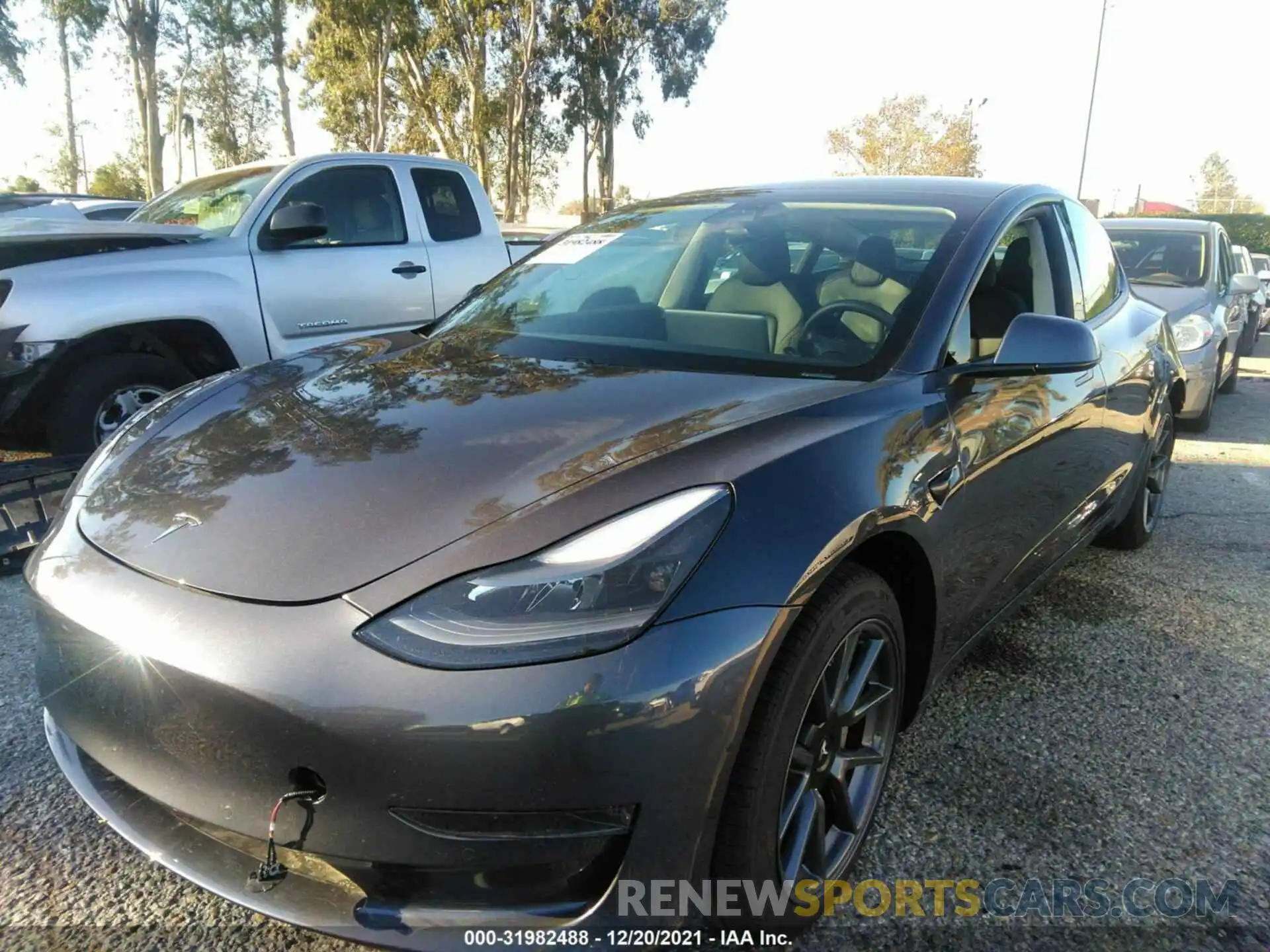 2 Photograph of a damaged car 5YJ3E1EA5MF940128 TESLA MODEL 3 2021