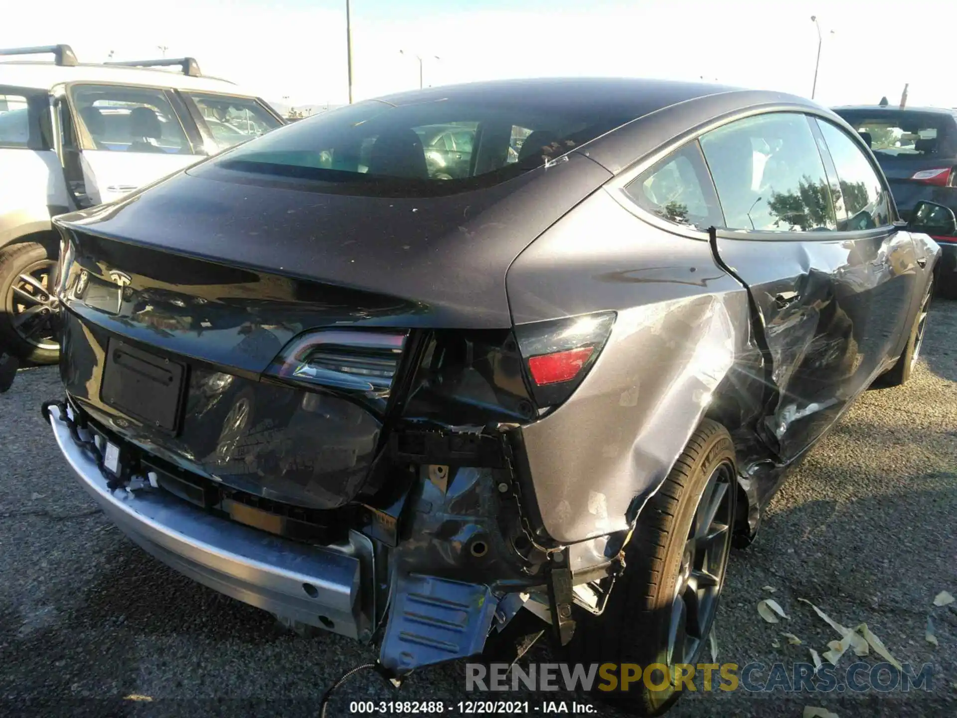 4 Photograph of a damaged car 5YJ3E1EA5MF940128 TESLA MODEL 3 2021