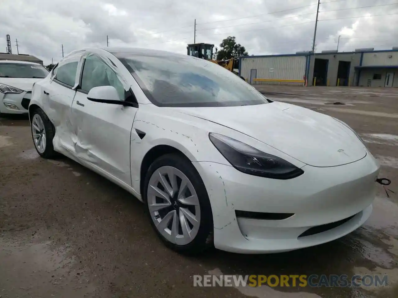 1 Photograph of a damaged car 5YJ3E1EA5MF990852 TESLA MODEL 3 2021