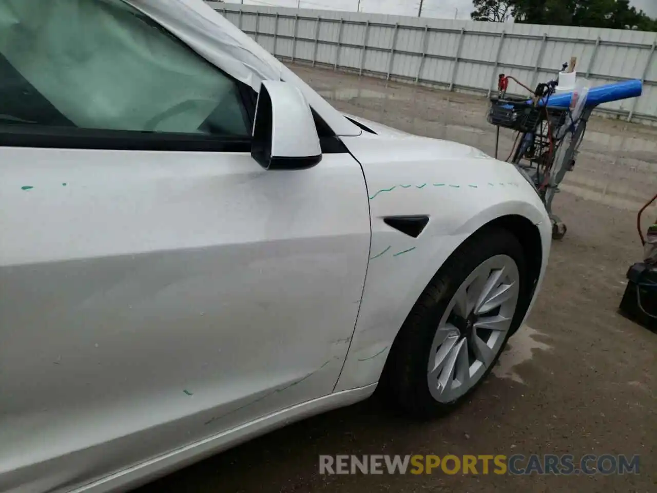 10 Photograph of a damaged car 5YJ3E1EA5MF990852 TESLA MODEL 3 2021