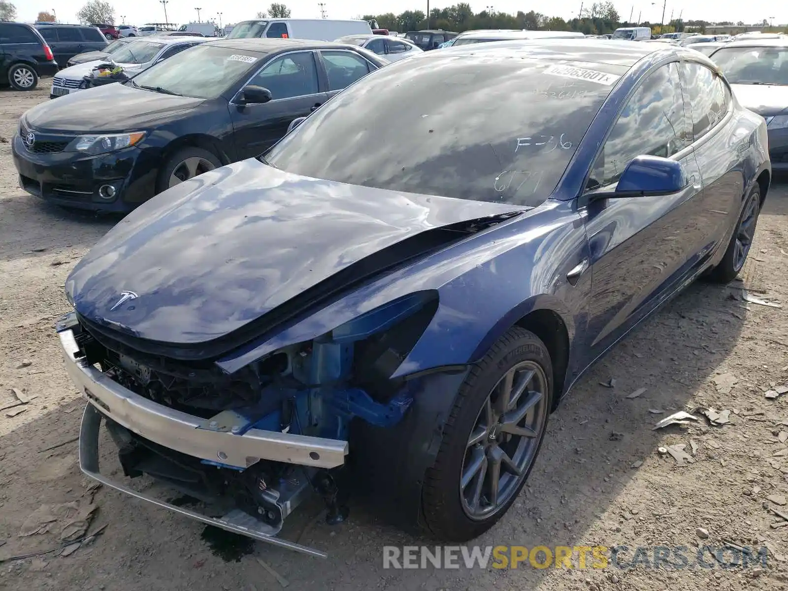 2 Photograph of a damaged car 5YJ3E1EA5MF996179 TESLA MODEL 3 2021