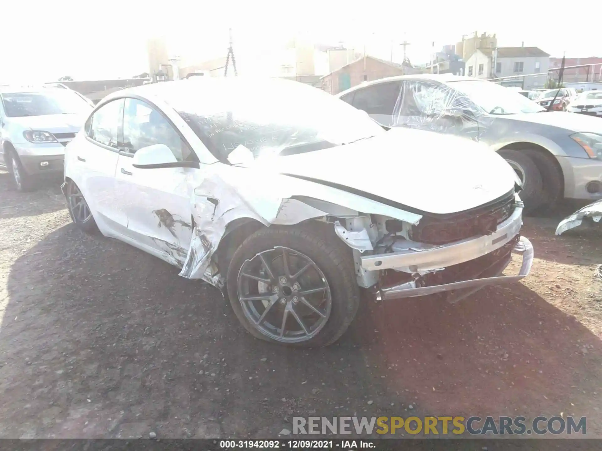 6 Photograph of a damaged car 5YJ3E1EA6MF016409 TESLA MODEL 3 2021