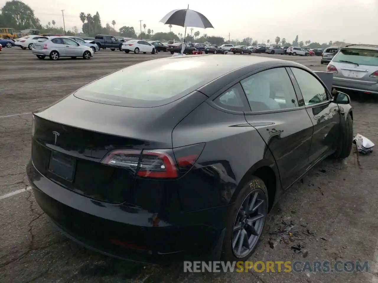 4 Photograph of a damaged car 5YJ3E1EA6MF052410 TESLA MODEL 3 2021