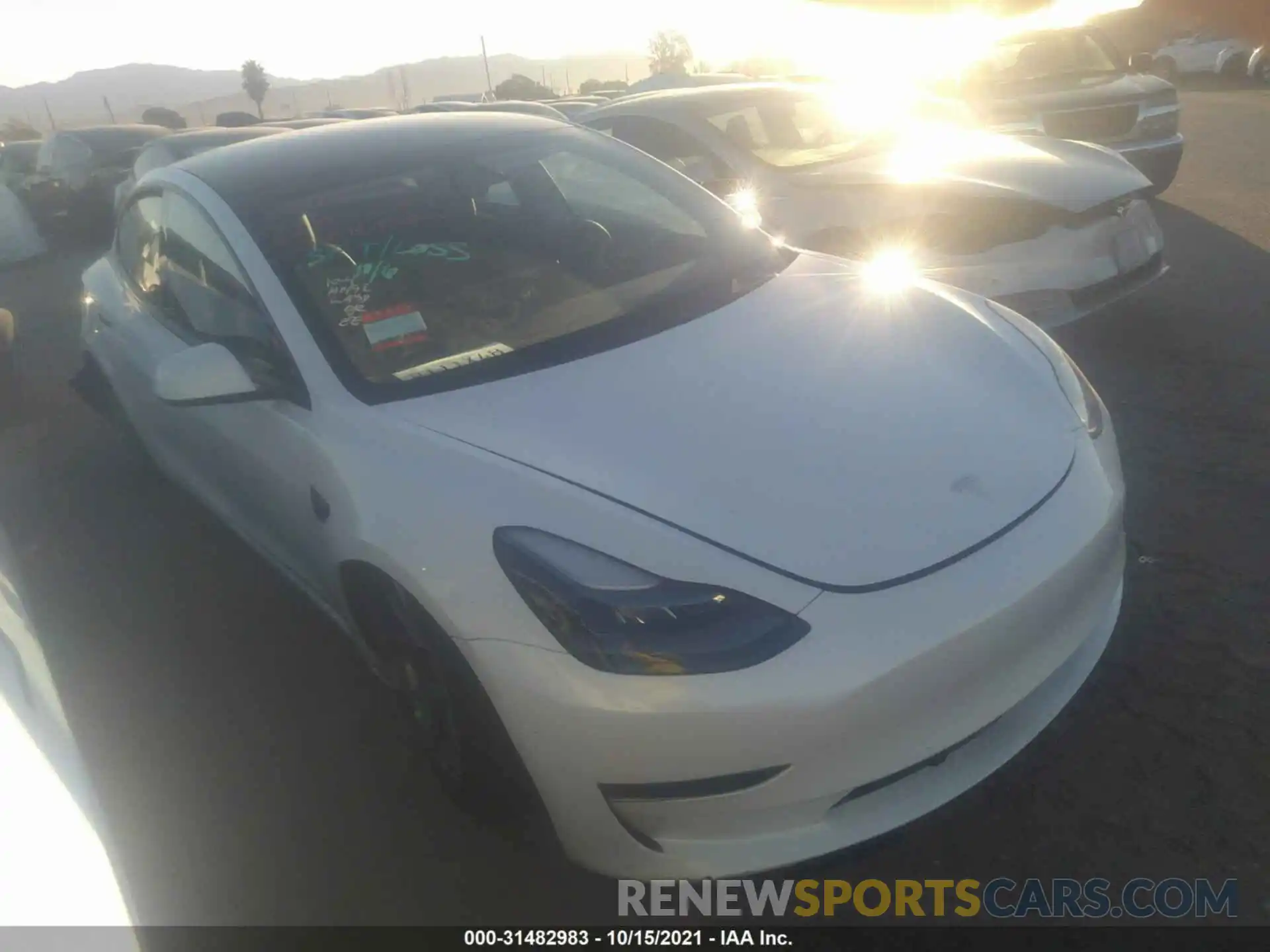 1 Photograph of a damaged car 5YJ3E1EA6MF067103 TESLA MODEL 3 2021