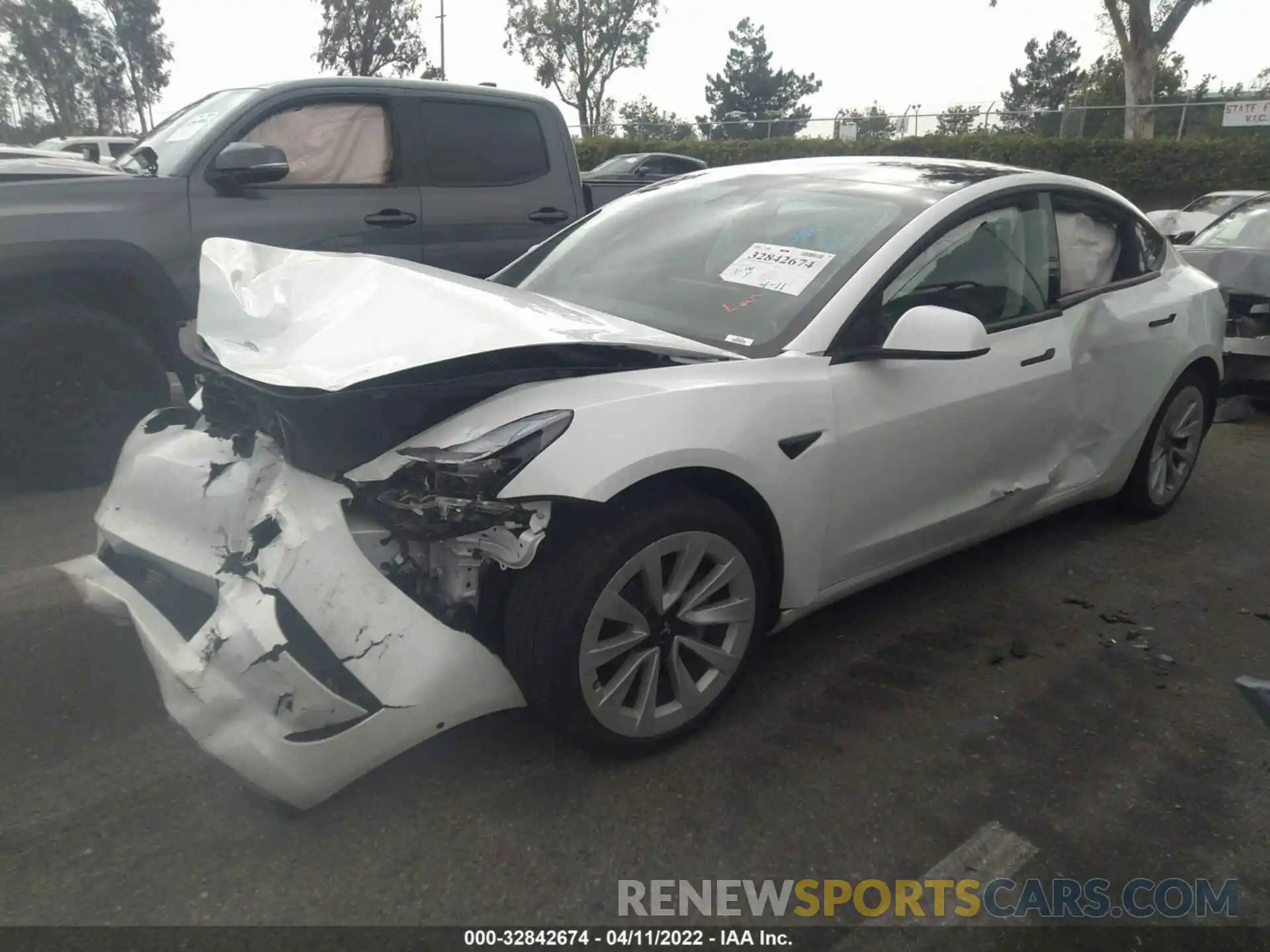 2 Photograph of a damaged car 5YJ3E1EA6MF067814 TESLA MODEL 3 2021