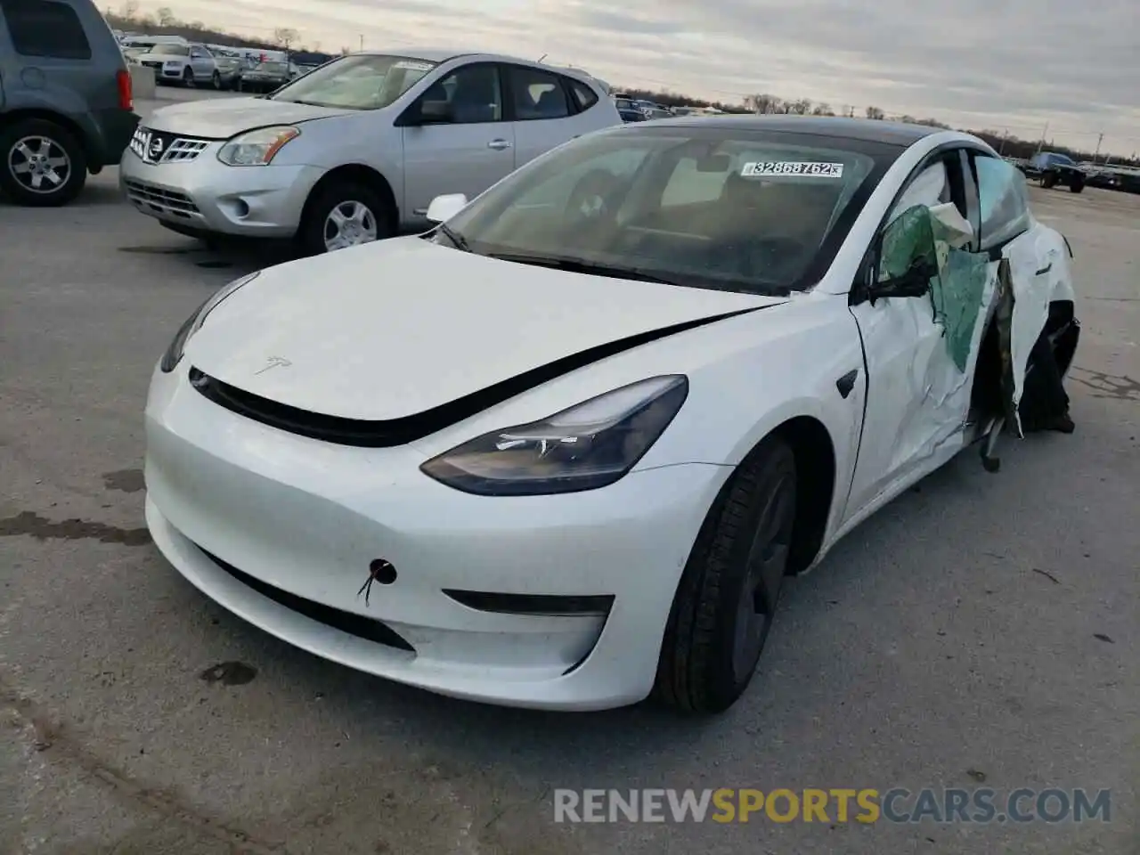 2 Photograph of a damaged car 5YJ3E1EA6MF087903 TESLA MODEL 3 2021