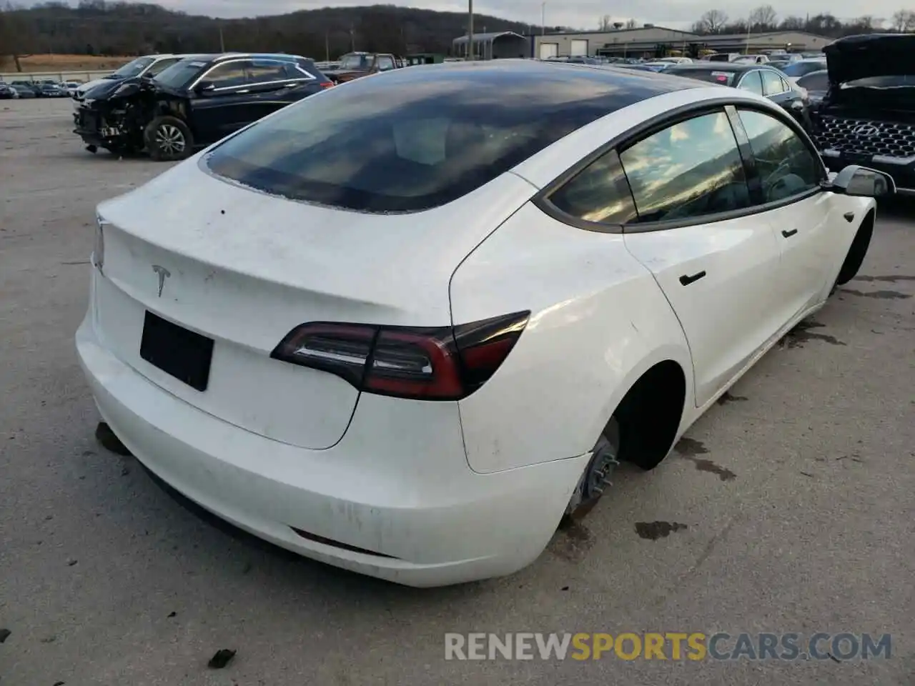 4 Photograph of a damaged car 5YJ3E1EA6MF087903 TESLA MODEL 3 2021