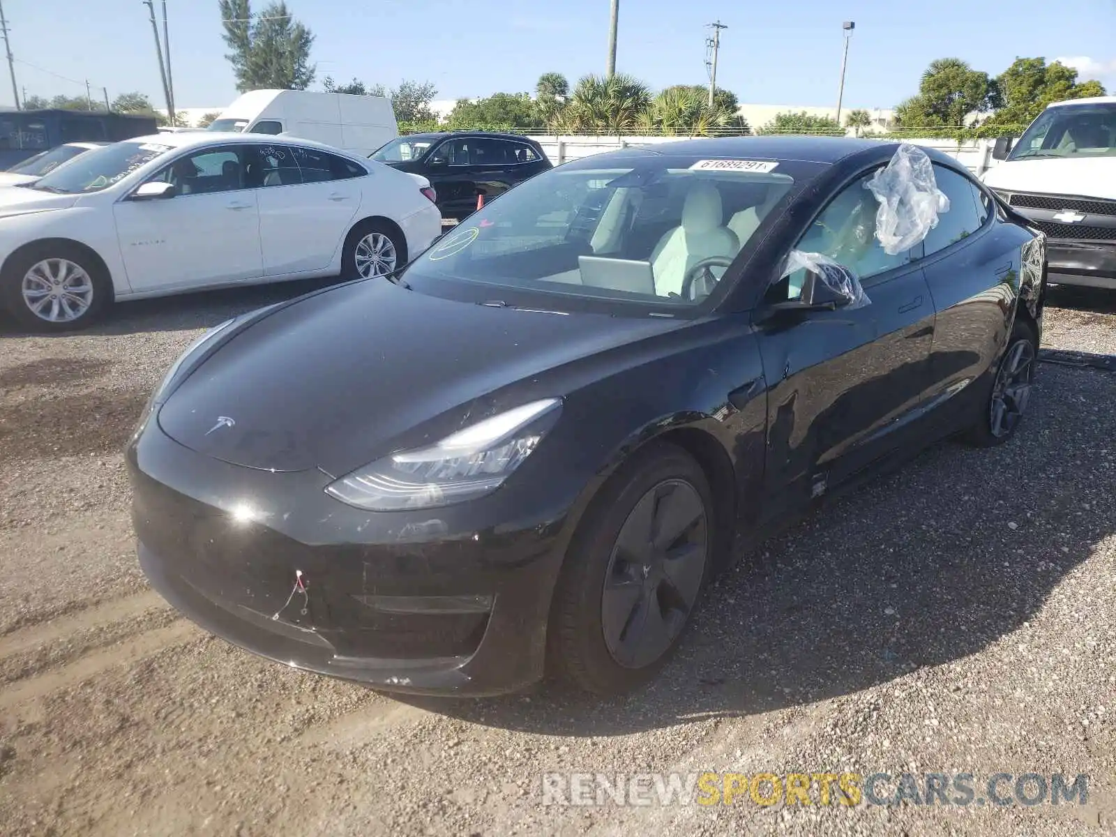 2 Photograph of a damaged car 5YJ3E1EA6MF856819 TESLA MODEL 3 2021