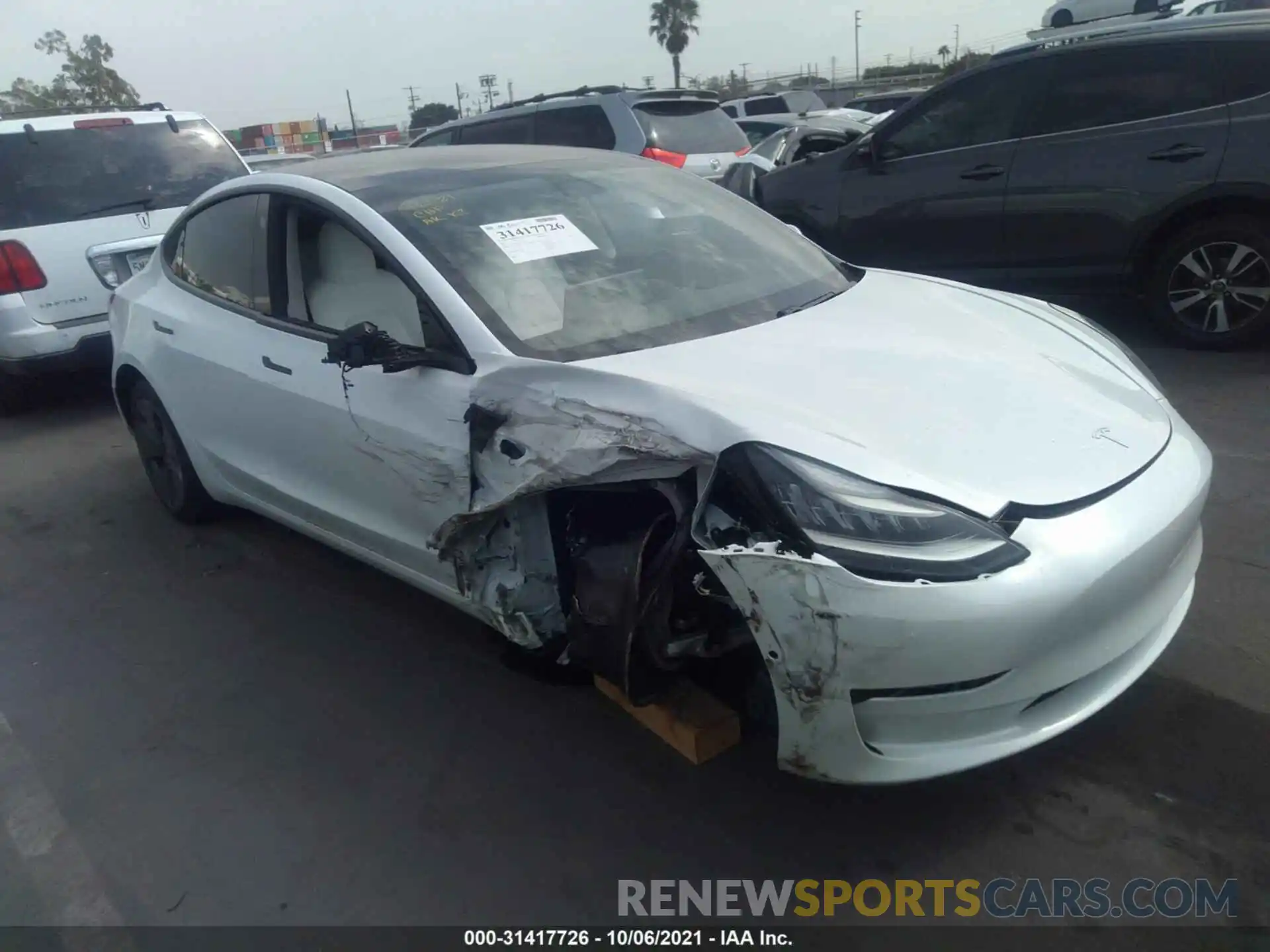 1 Photograph of a damaged car 5YJ3E1EA6MF857405 TESLA MODEL 3 2021